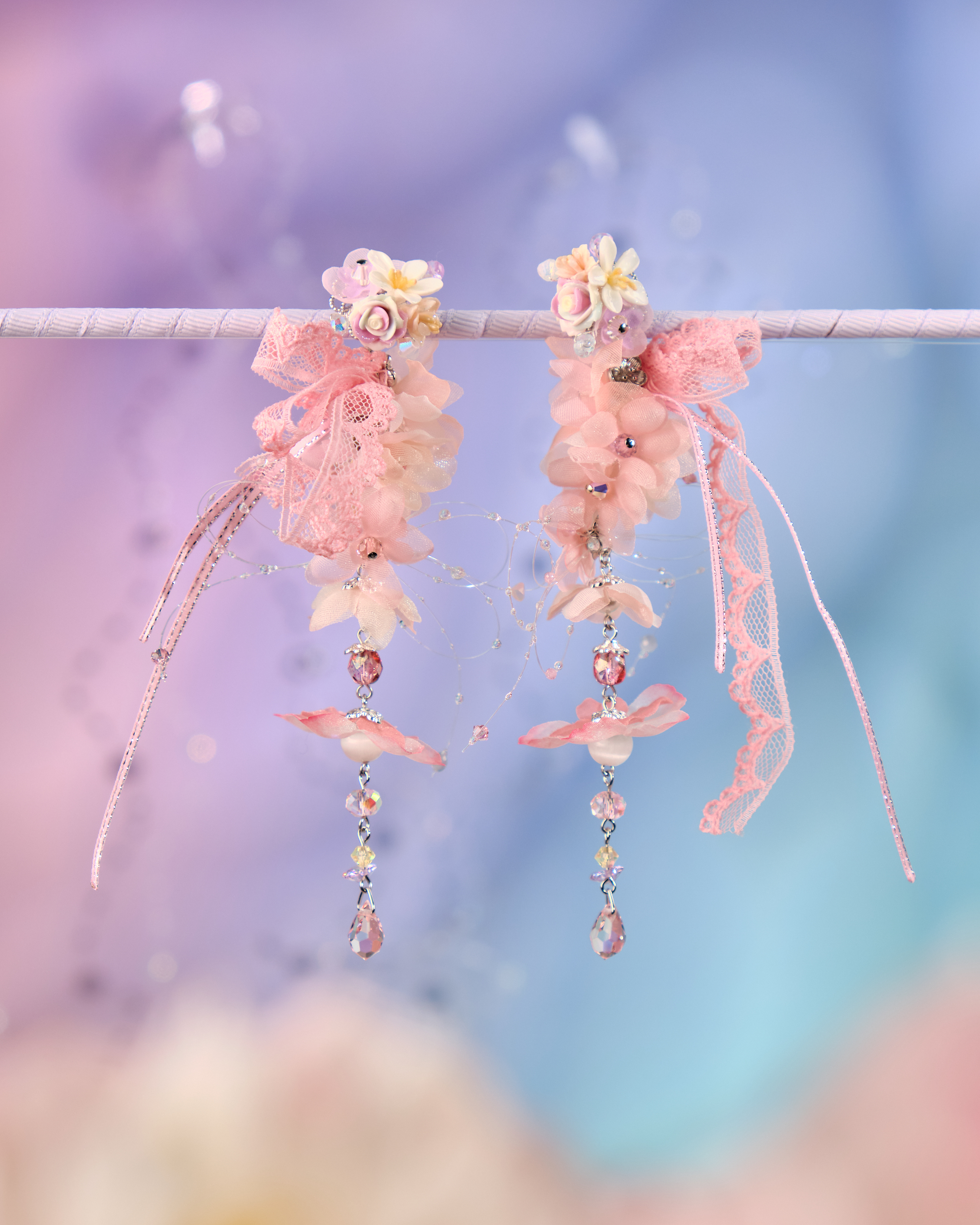 12076 絲帶小花羽翼耳環