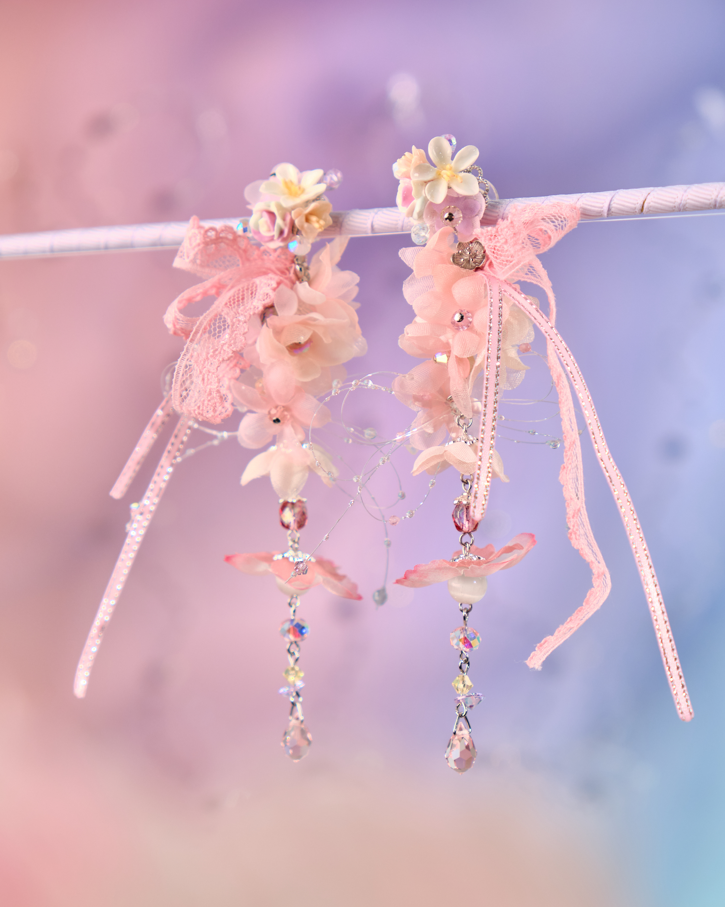 12076 絲帶小花羽翼耳環