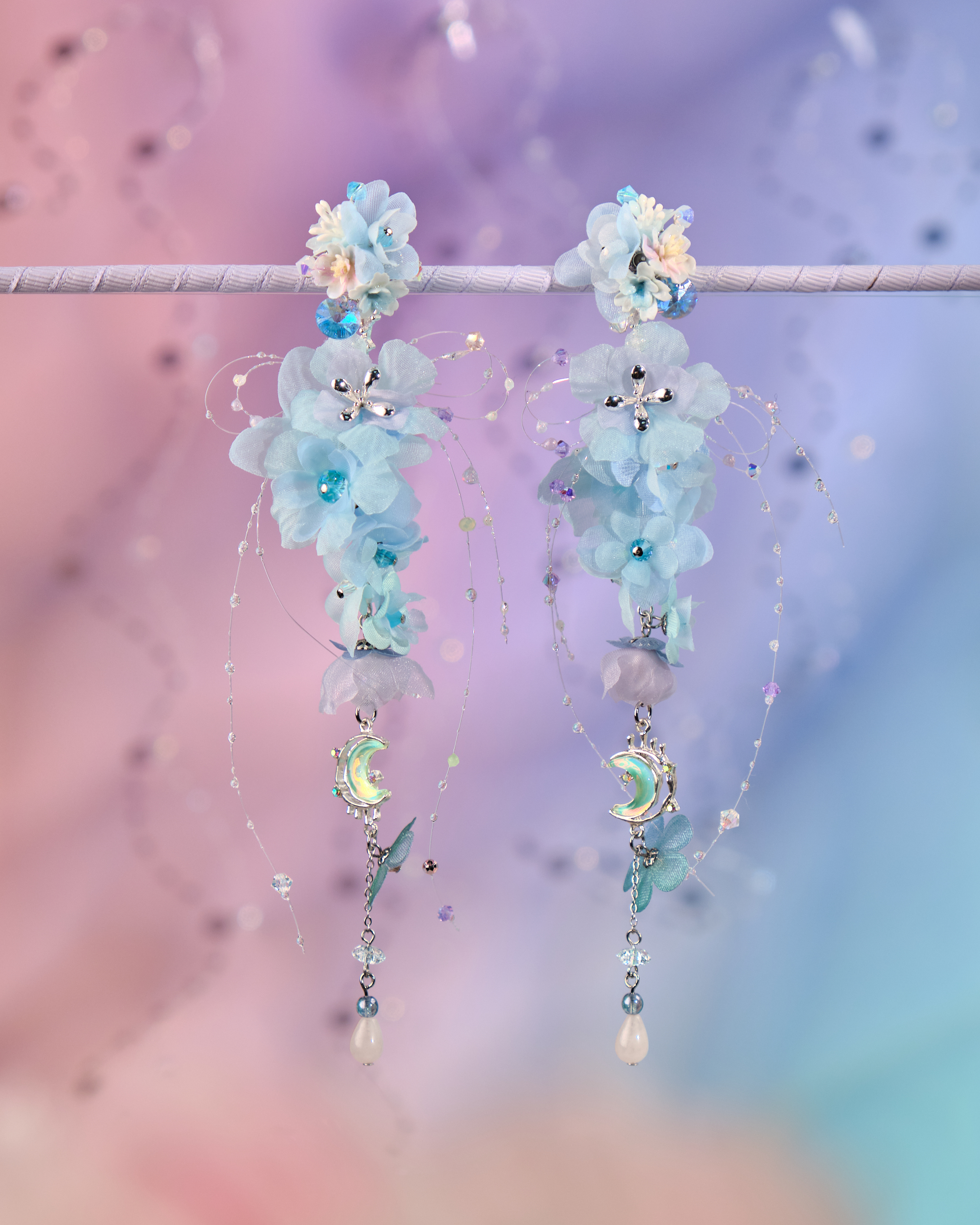 12075 絲帶小花羽翼耳環