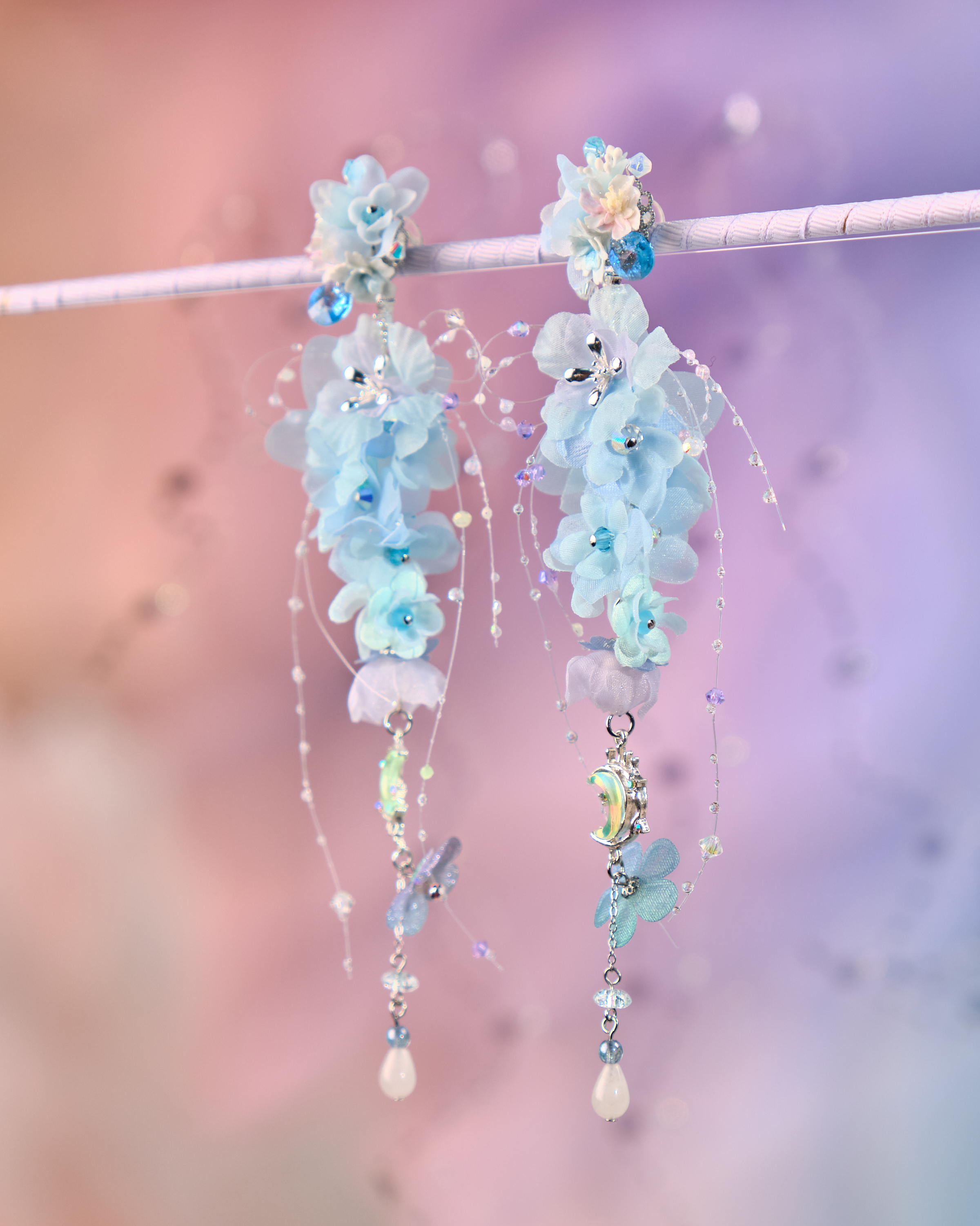 12075 絲帶小花羽翼耳環