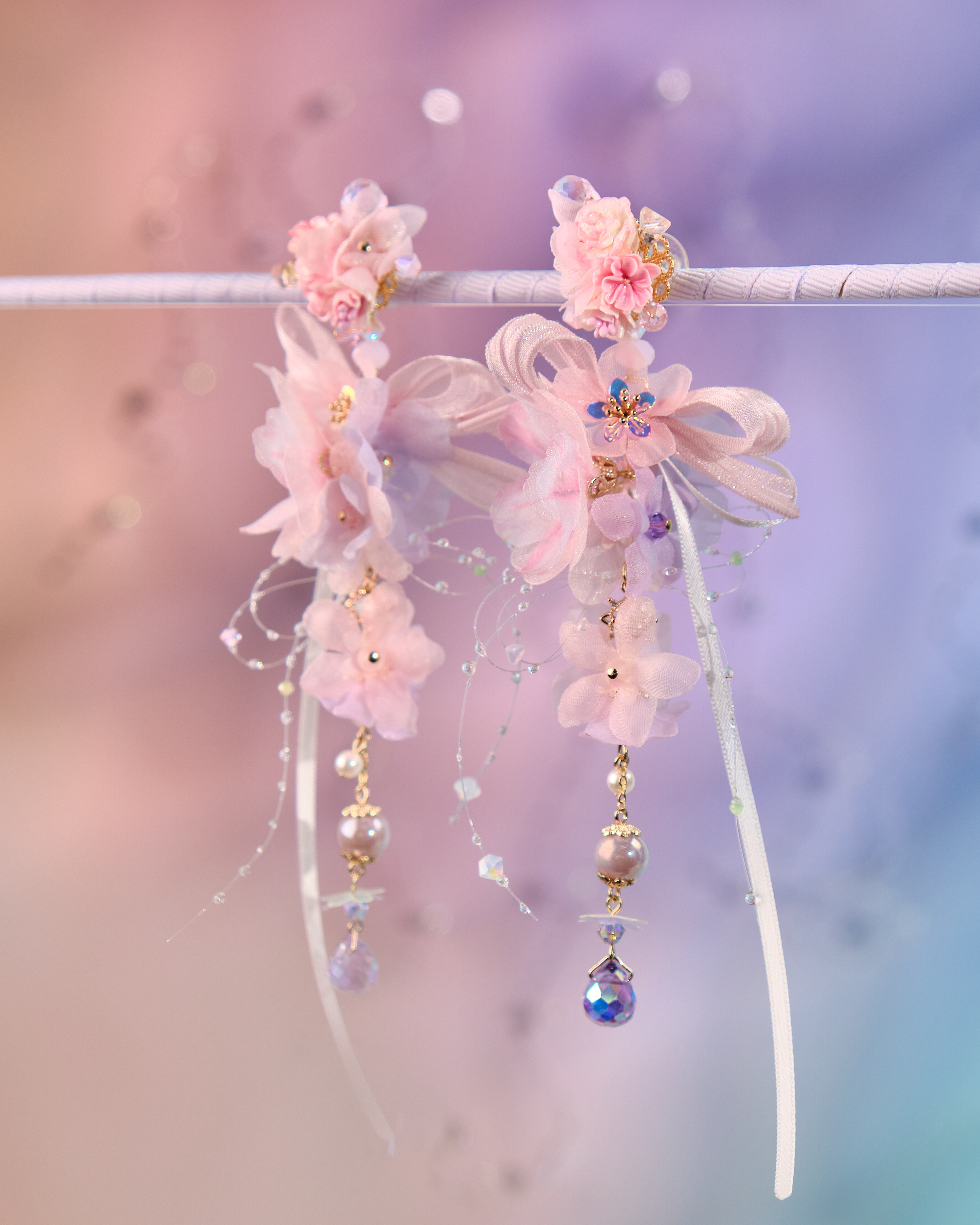 12074 絲帶小花羽翼耳環