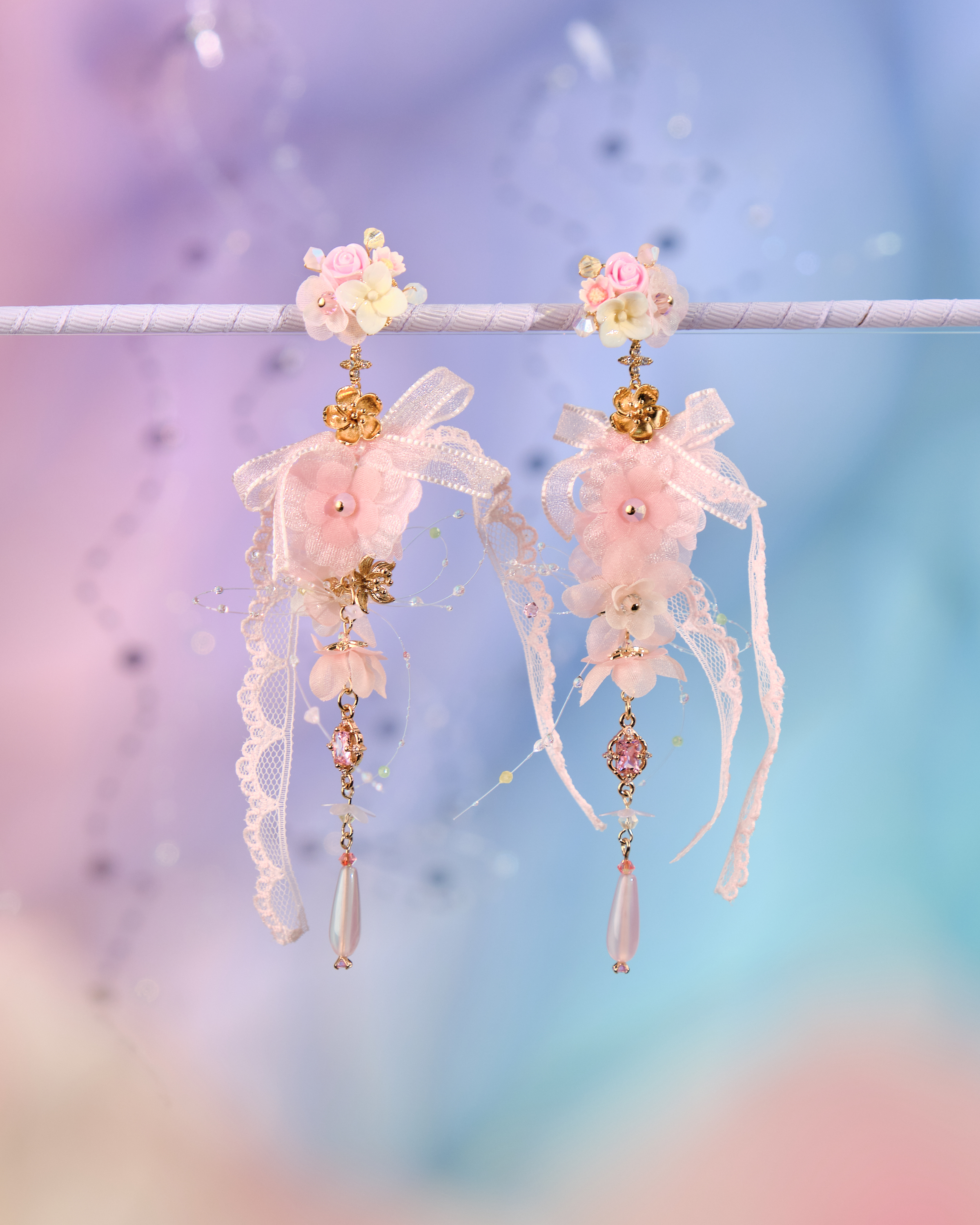 12073 絲帶小花羽翼耳環