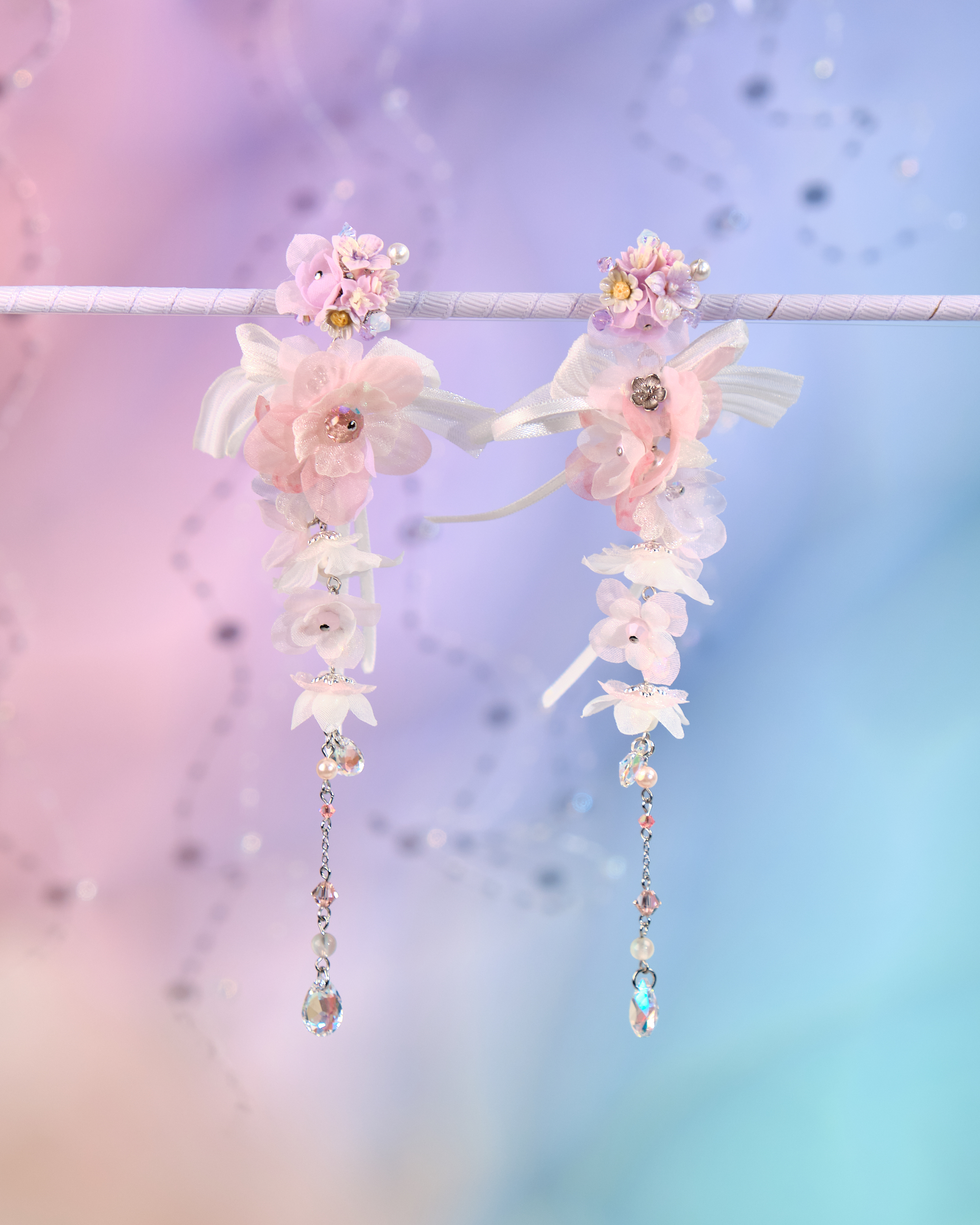 12072 絲帶小花羽翼耳環