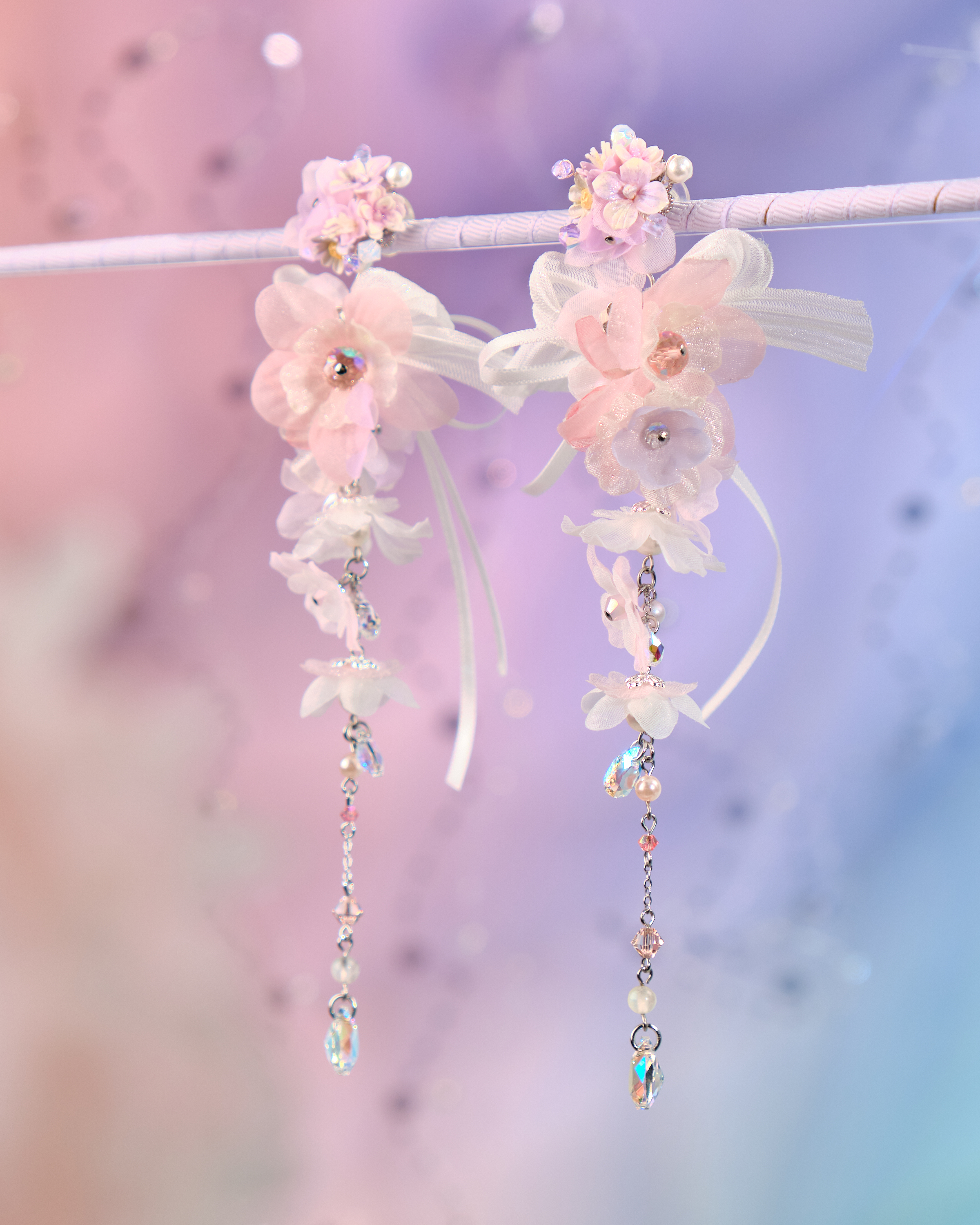 12072 絲帶小花羽翼耳環