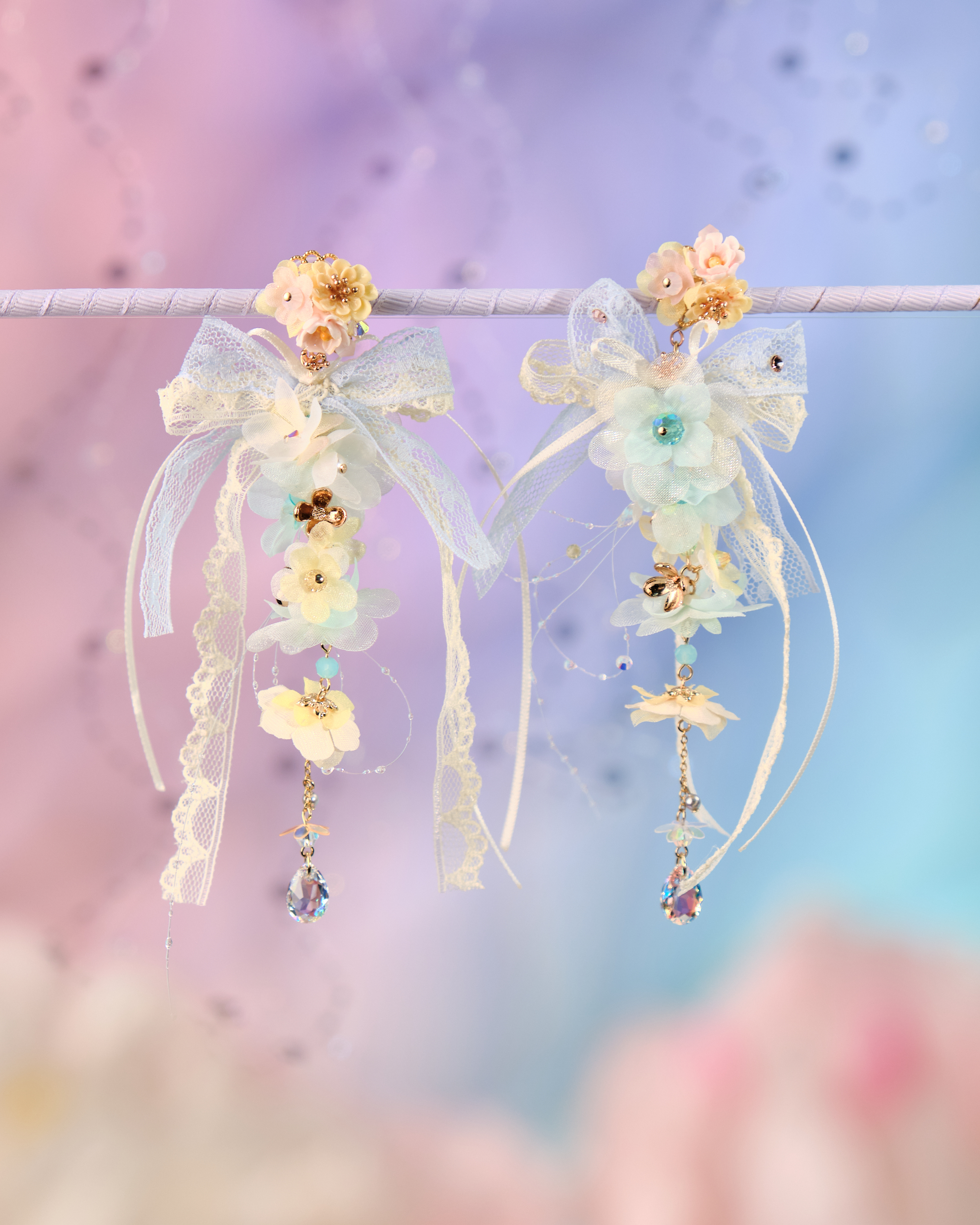 12071 絲帶小花羽翼耳環