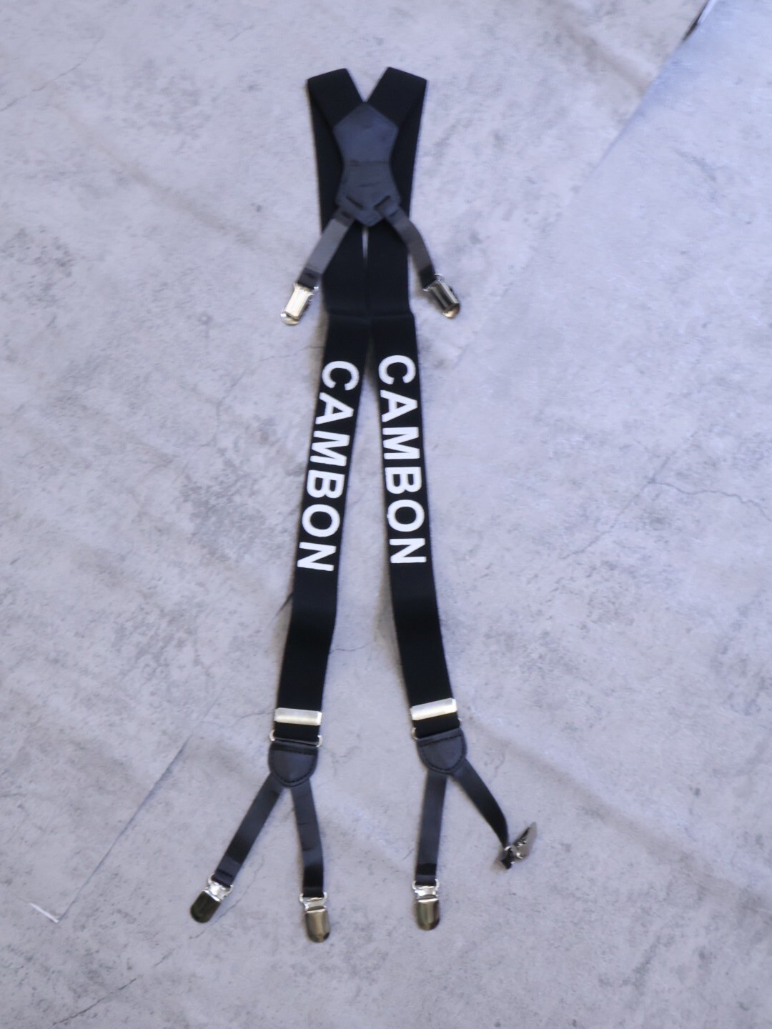 個性字母造型吊帶背夾