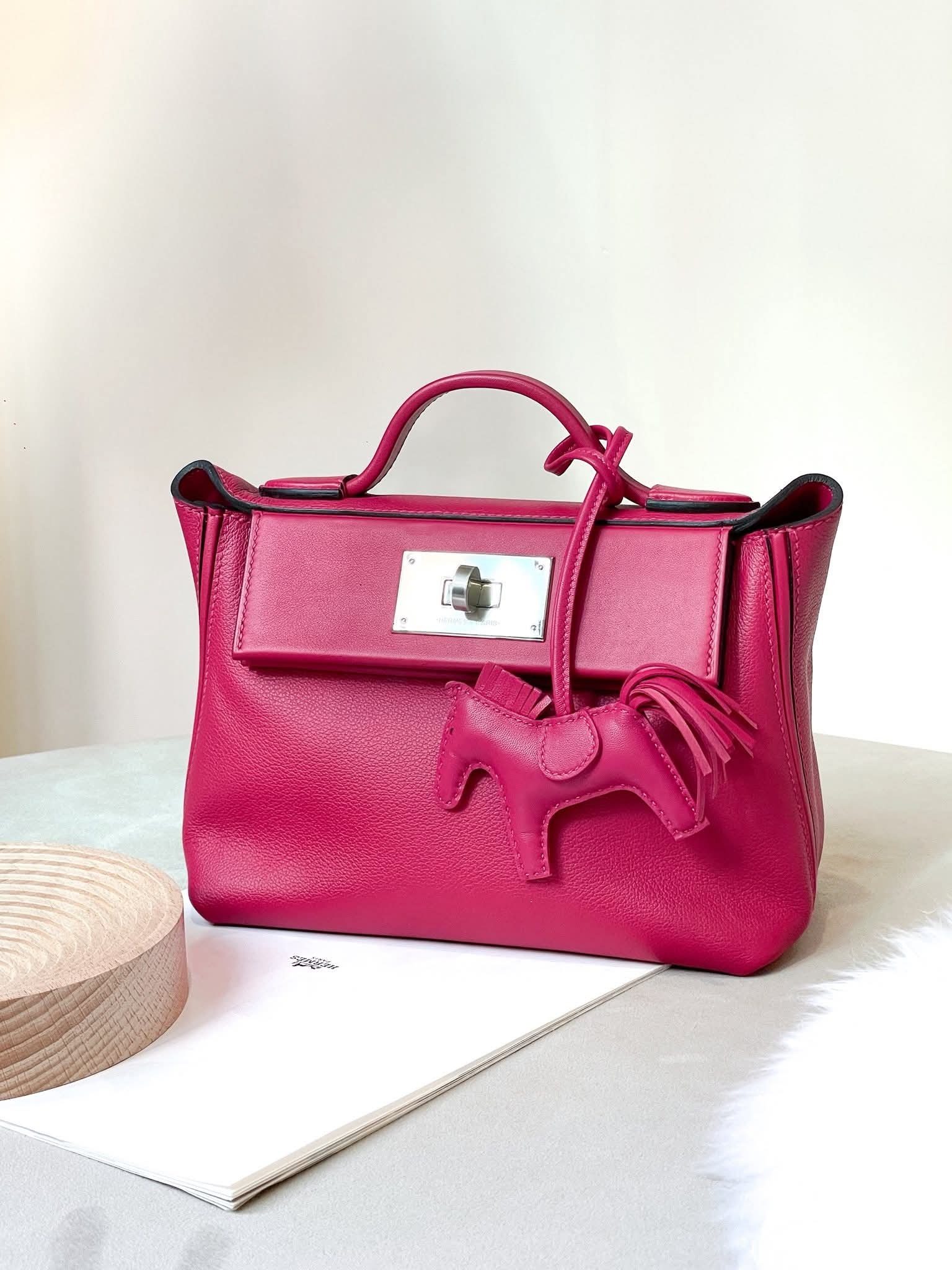 Preloved Hermès 24/24 Mini Evercolor Leather Framboise PHW HK$5x,xxx   (HK$2,000 即時落訂)