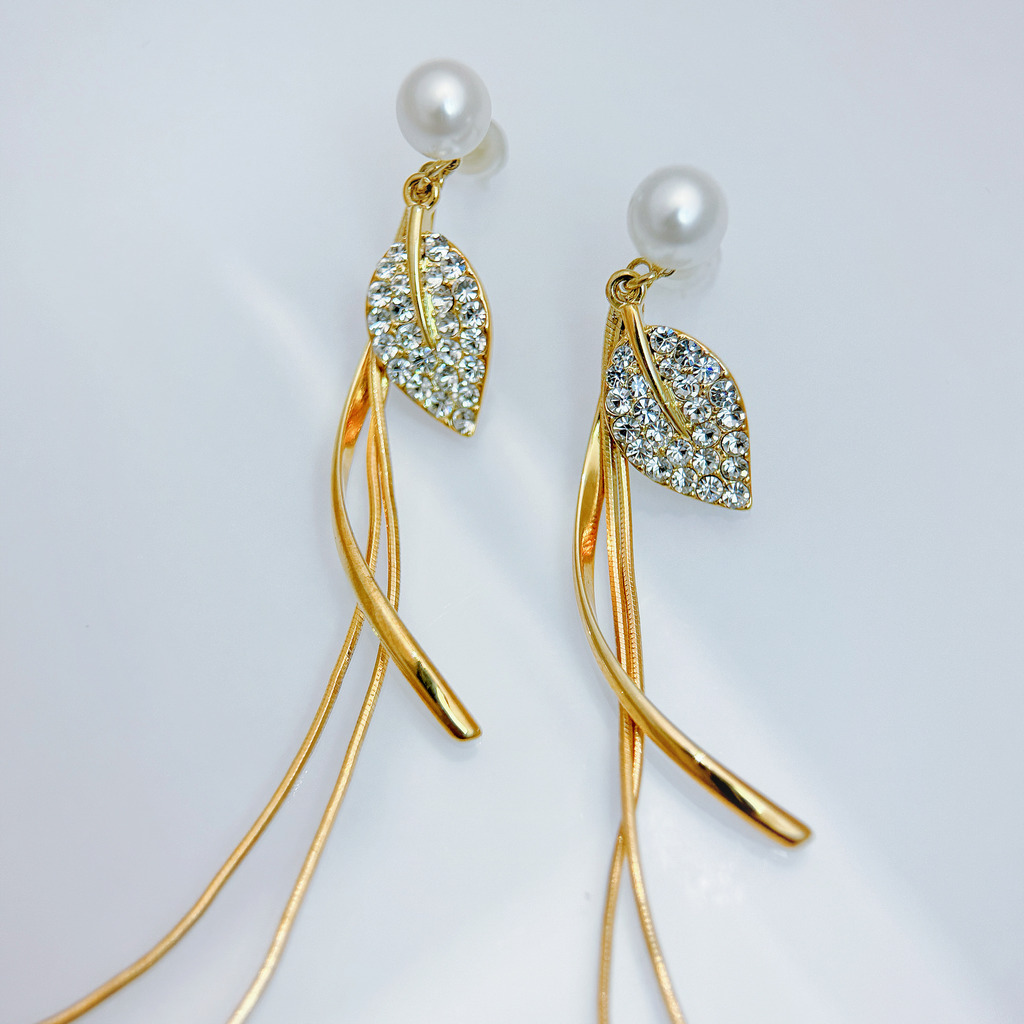 鏤空葉影流光耳環