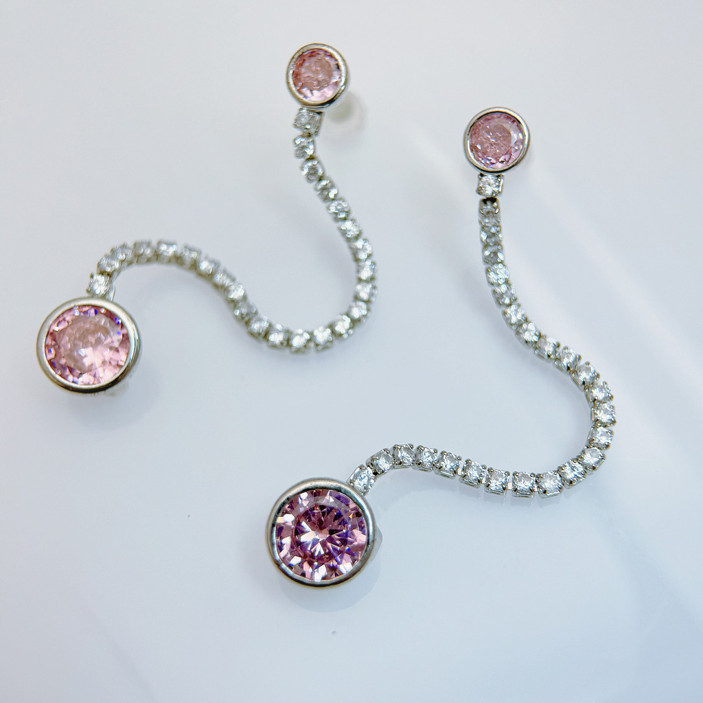 粉曜流線雙鑽耳環