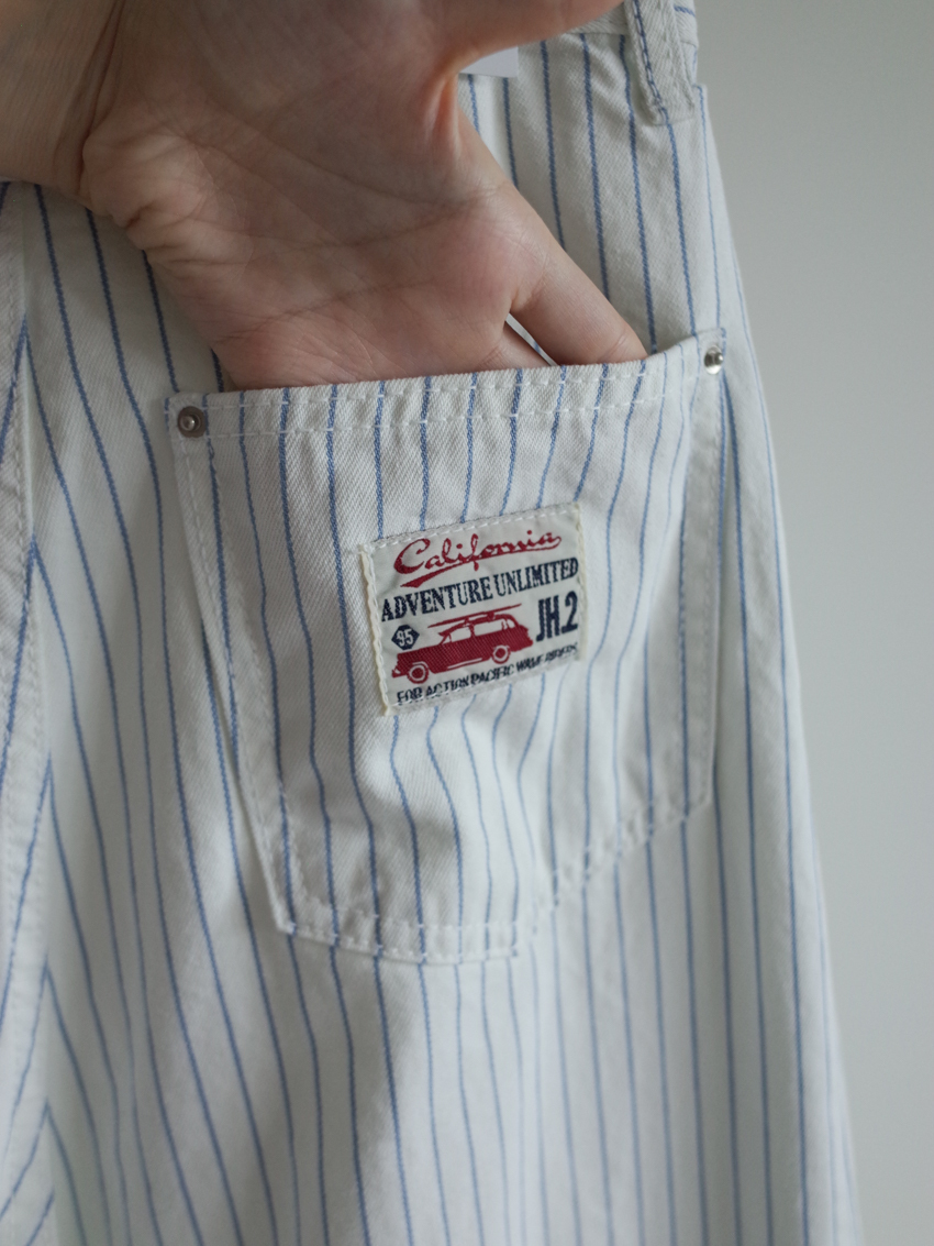 refreshing striped wide-leg trousers with american label detail in WHITE