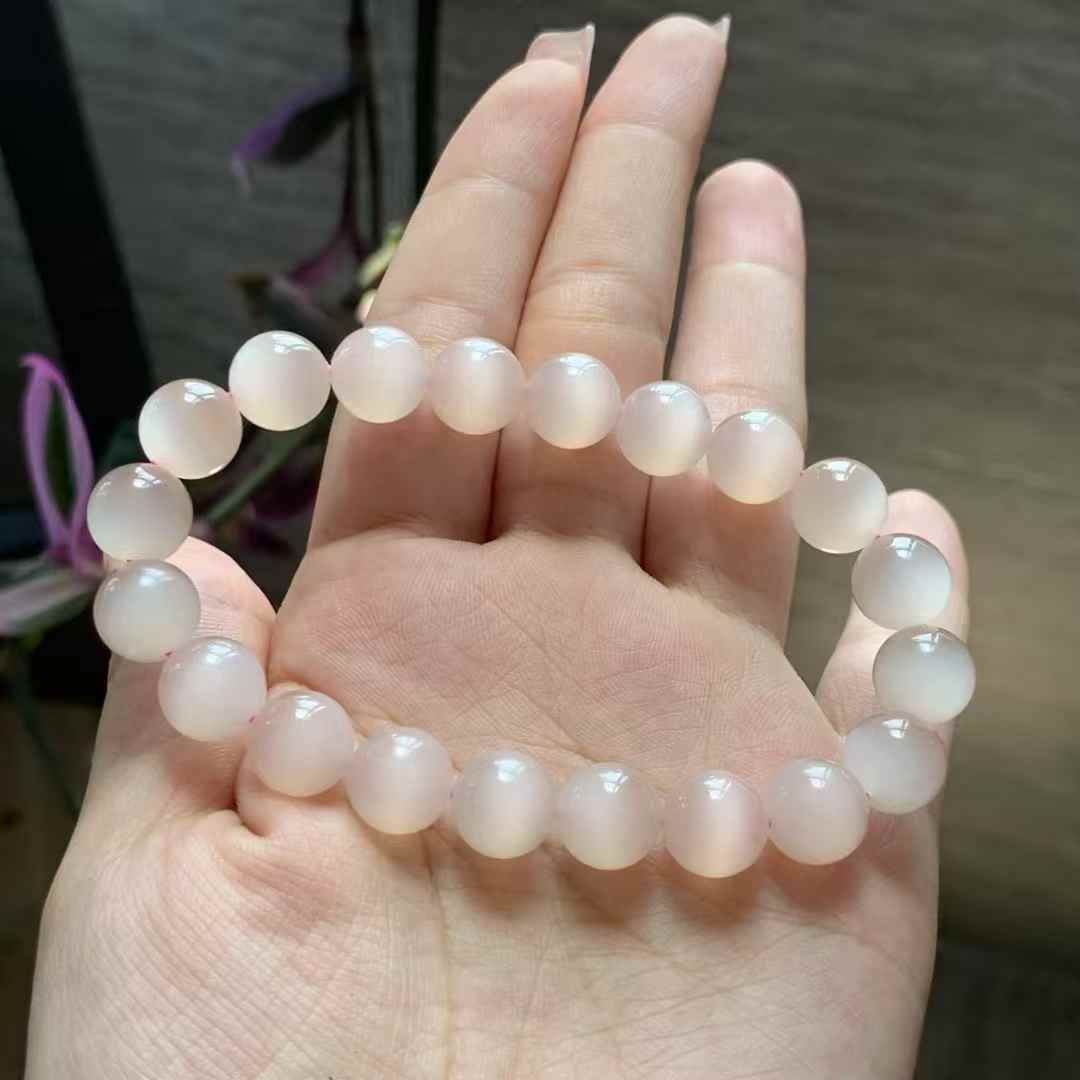 76778 和田玉藕粉貓眼手串