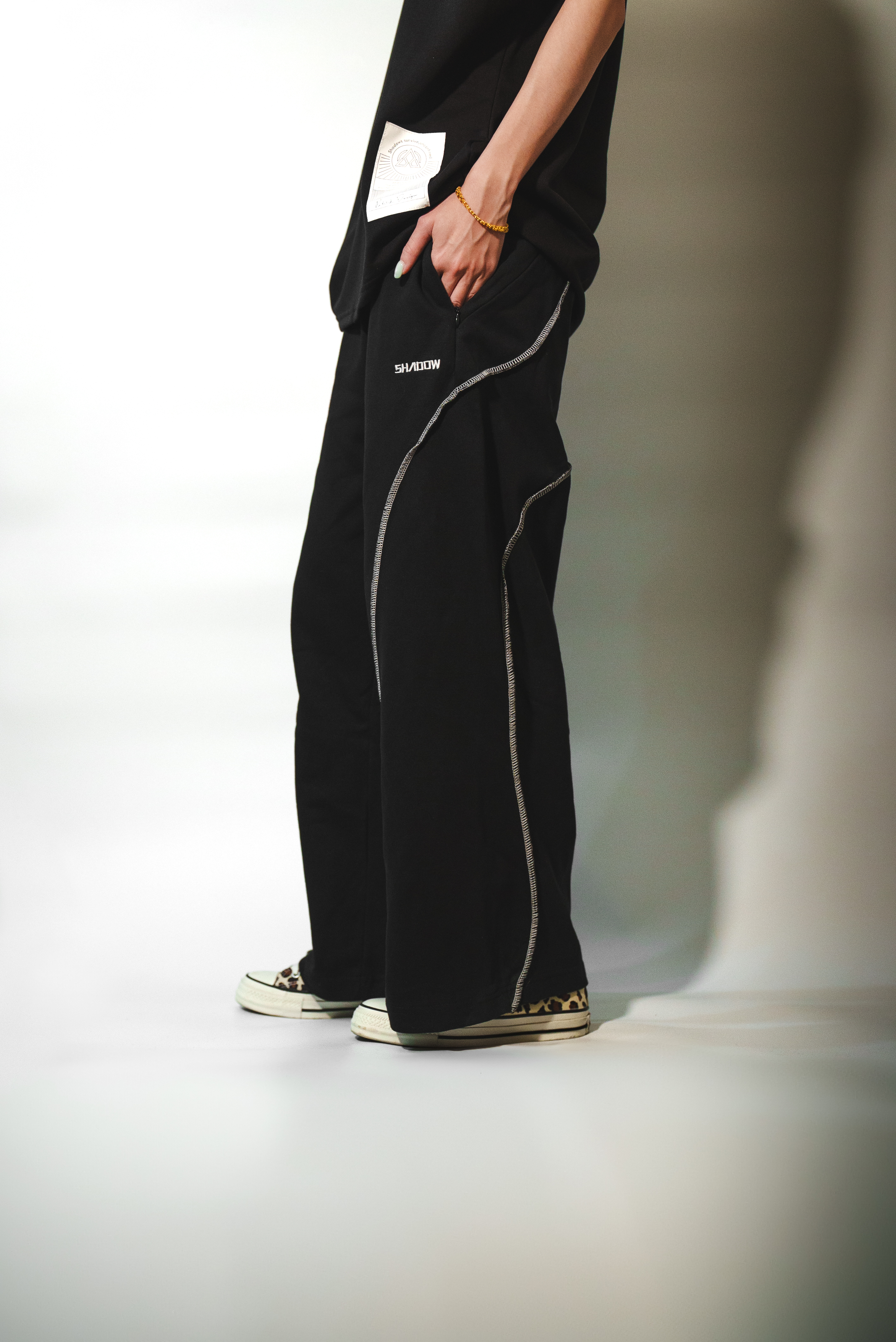 SPLICED FLARE TRACK PANTS / 線條拼接喇叭運動褲