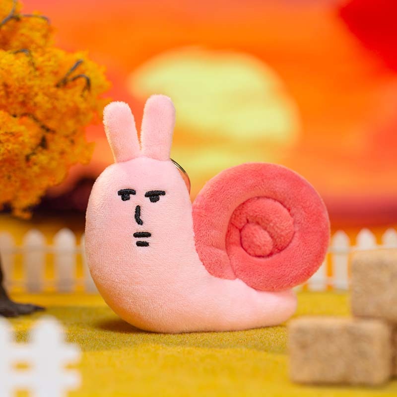 粉紅兔子蝸牛絨毛吊飾