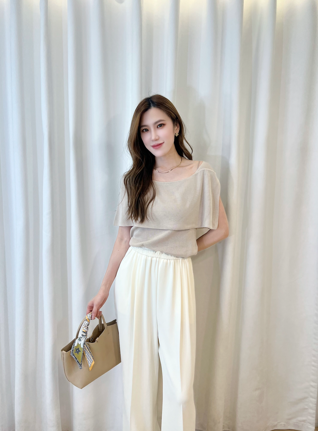 開衩袖裁片針織上衣