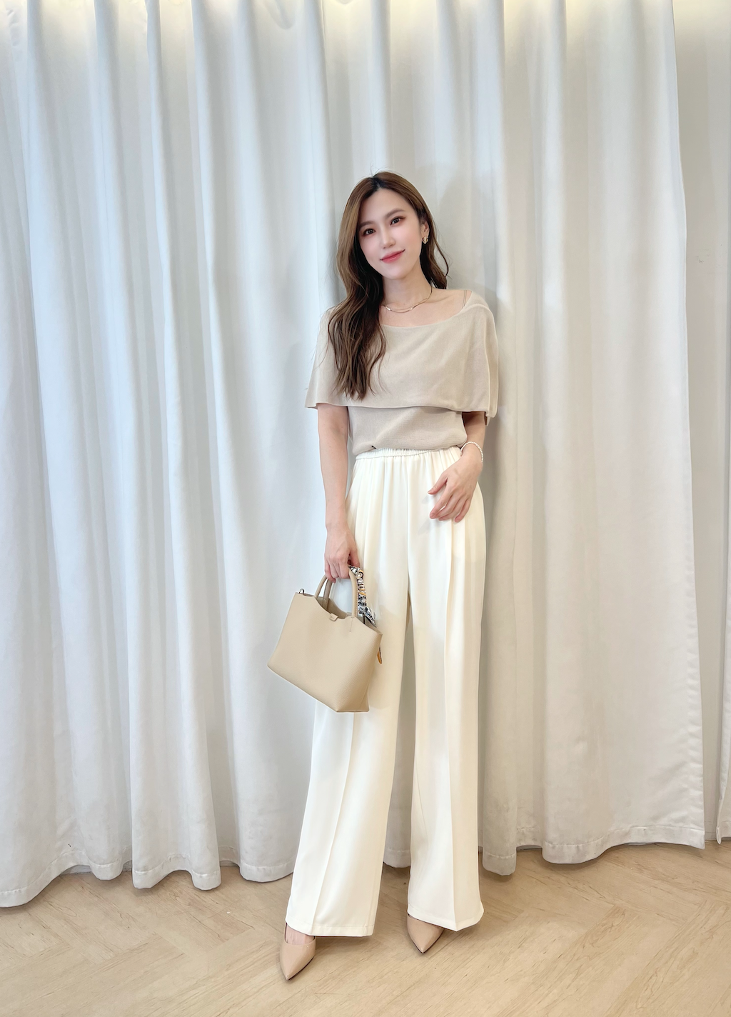 開衩袖裁片針織上衣