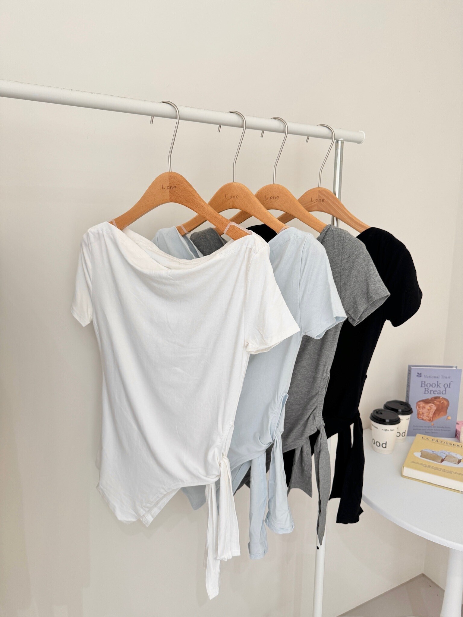 一字領下擺不規帶上衣