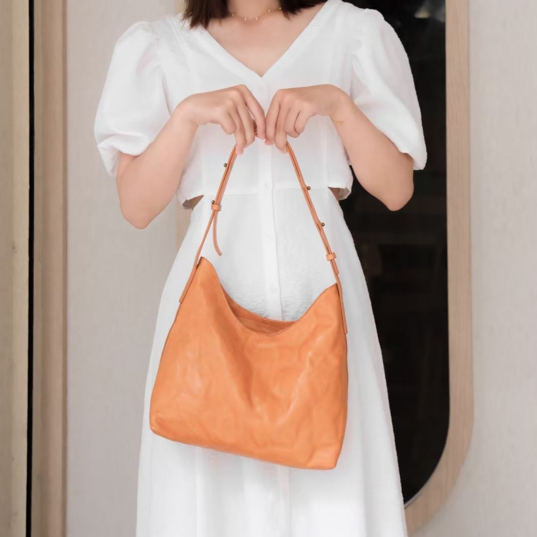 歐蘿拉 真皮微笑半月包(真皮女包/軟牛皮/肩背手提)