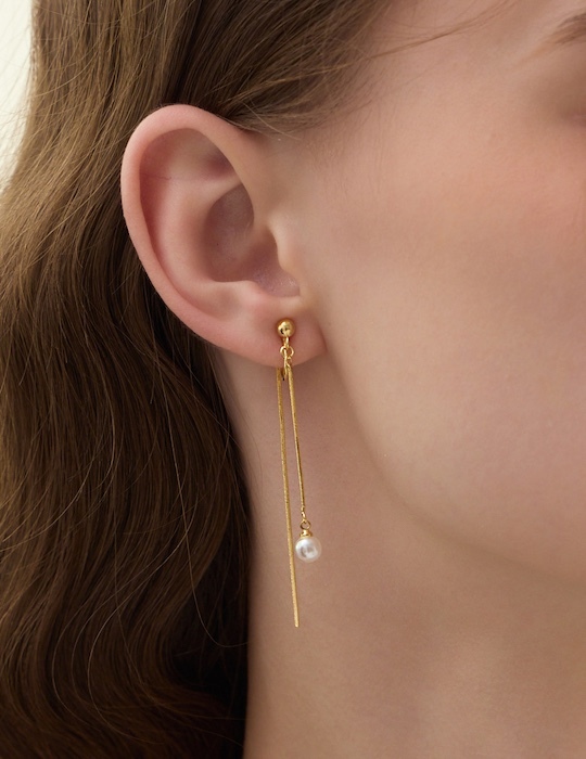 典雅交織珍珠。夾式耳環