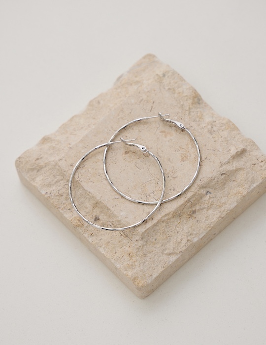 幾何稜光切面。銀針耳環(銀)