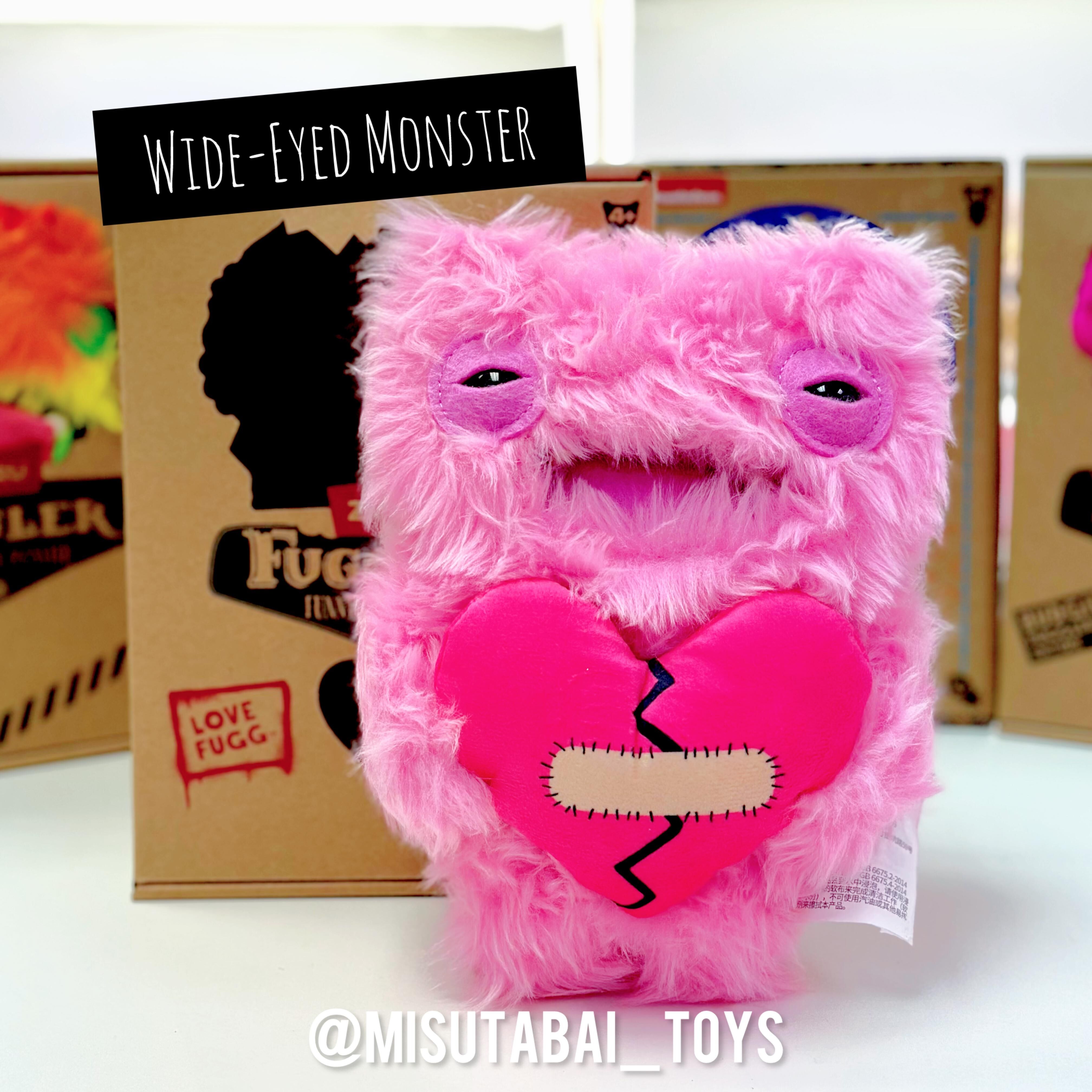 FG74928 FG74522 FUGGLER Love Fugg: Worry Star Monster (Red)/ Wide-Eyed Monster (Pink)