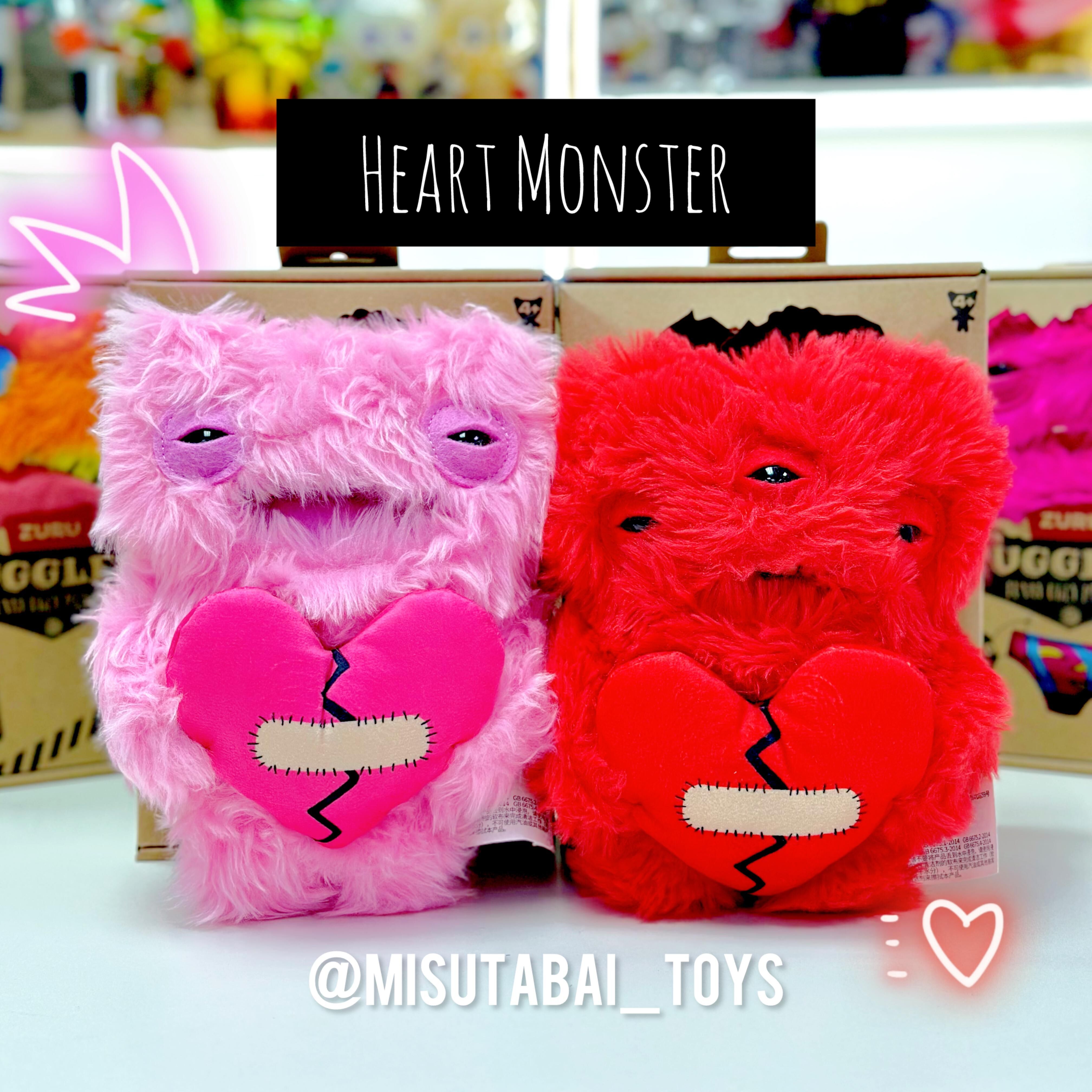 FG74928 FG74522 FUGGLER Love Fugg: Worry Star Monster (Red)/ Wide-Eyed Monster (Pink)