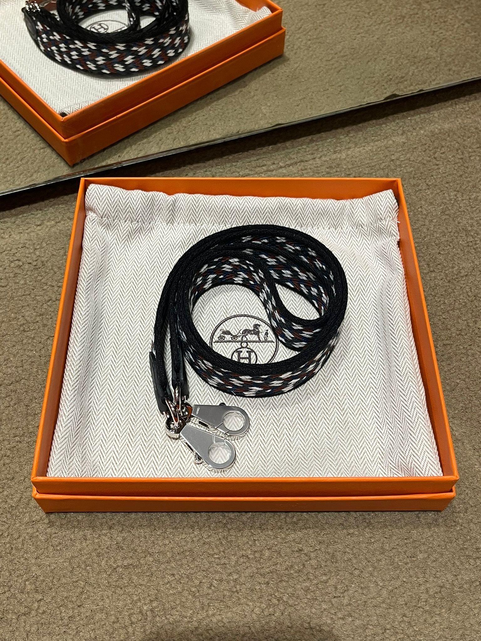 Bandouliere sangle zigzag 25mm noir/blanc 85cm