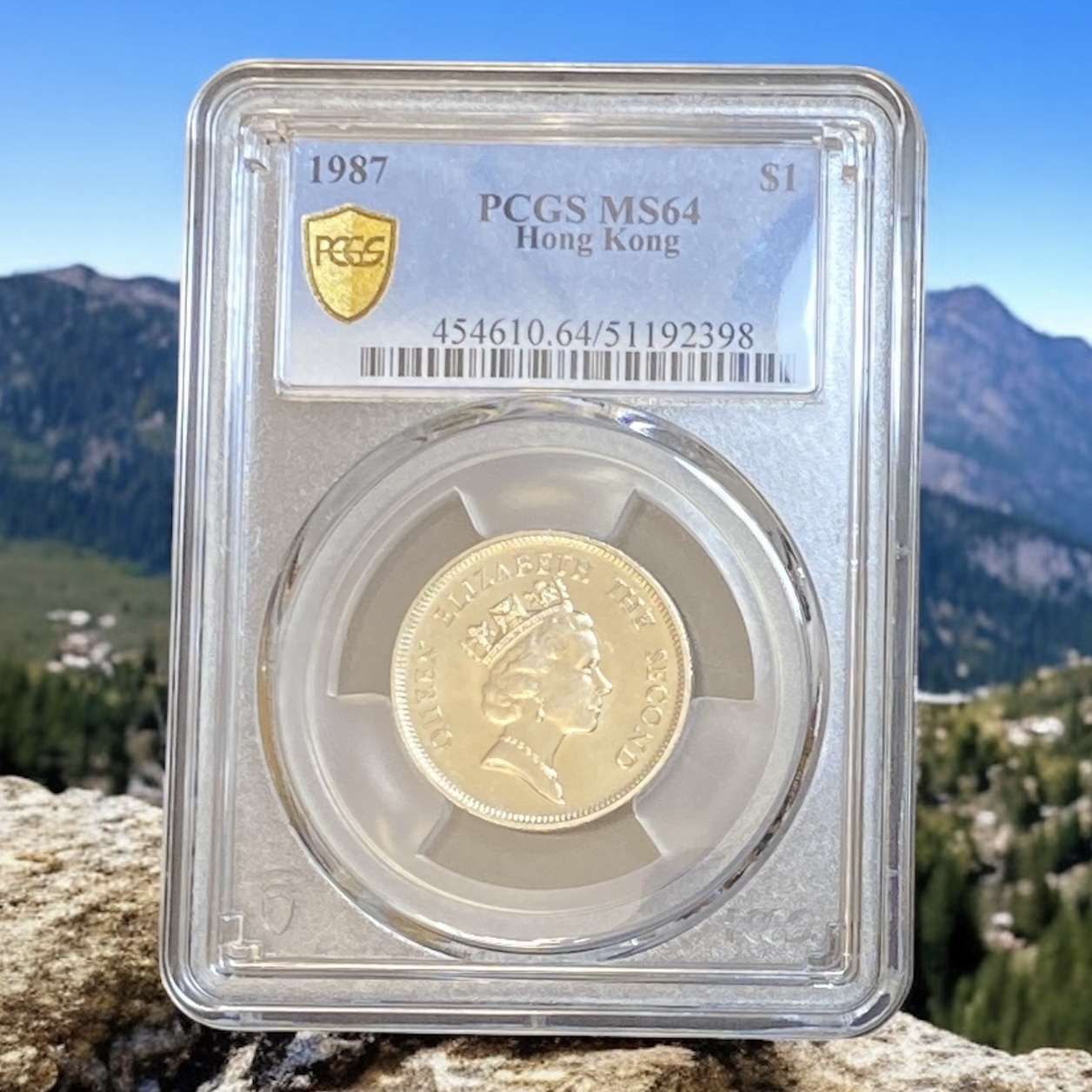 1987 Queen Elizabeth II One Dollar (PCGS MS 64), Available for Purchase in Multiples