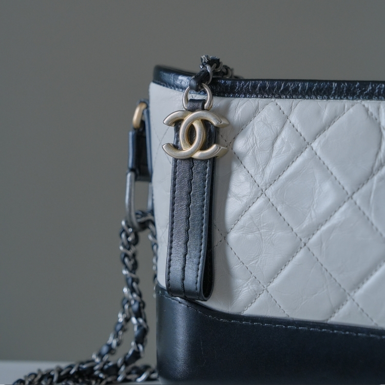 Chanel 白色黑邊流浪包
