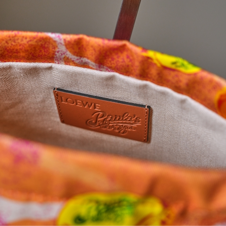 Loewe 橘色瓶蓋眼罩+盥洗袋