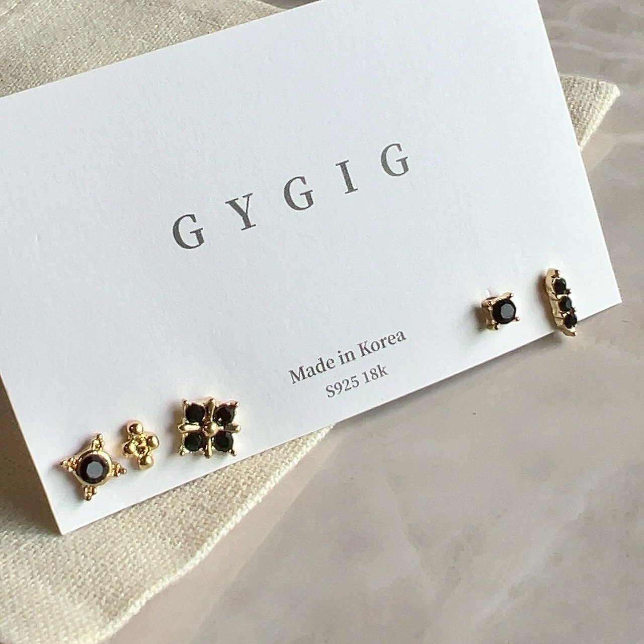 mini”黑鑽金小四葉草5件組耳釘