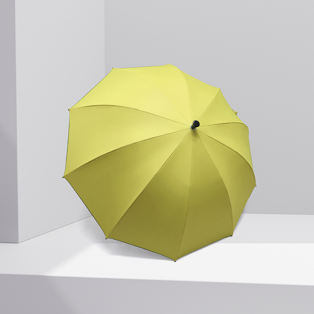 在一個白色背景展示展開的25吋10骨登山休閒傘_黃色