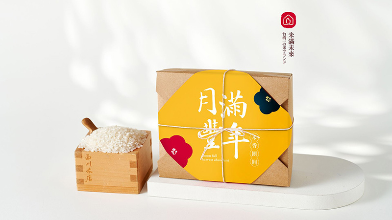 西川米店月滿豐年中秋米禮盒，黃金色系搭配吉祥字樣，傳遞圓滿與豐收的中秋寓意