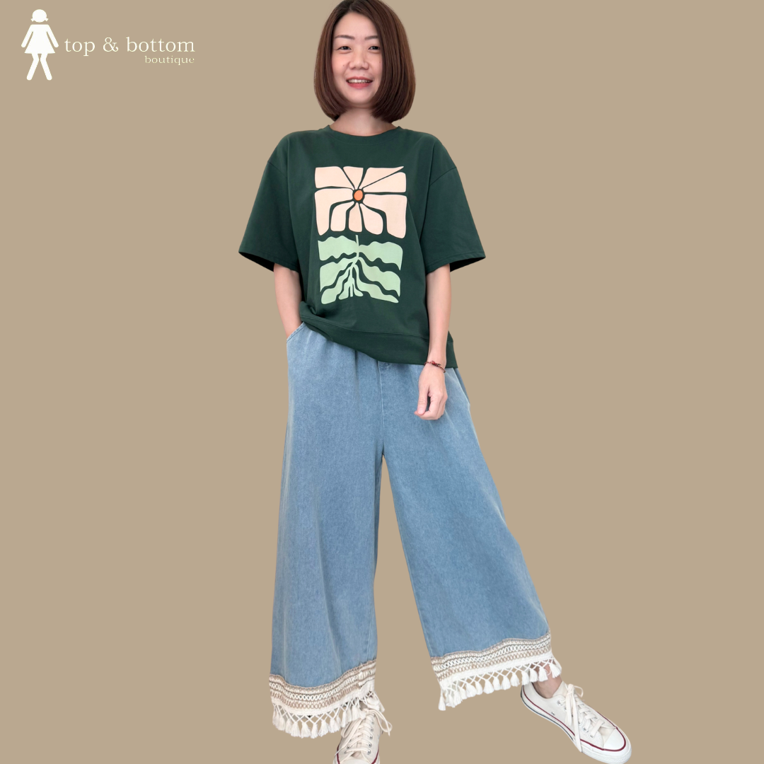 ELASTIC WAISTED ANKLE JEANS WITH TASSEL HEM