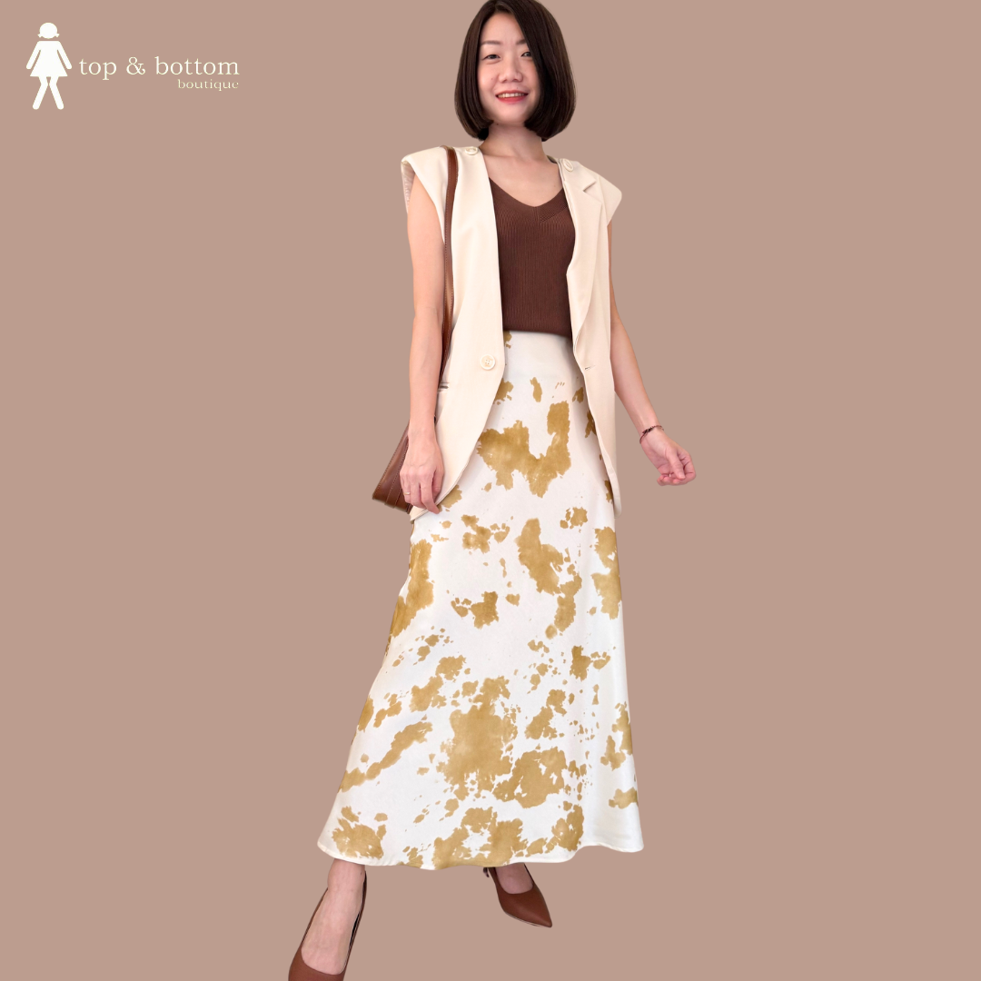 SLEEVELESS LONG VEST WITH BUTTON DETAILS