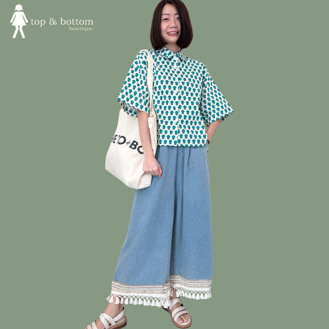 ELASTIC WAISTED ANKLE JEANS WITH TASSEL HEM