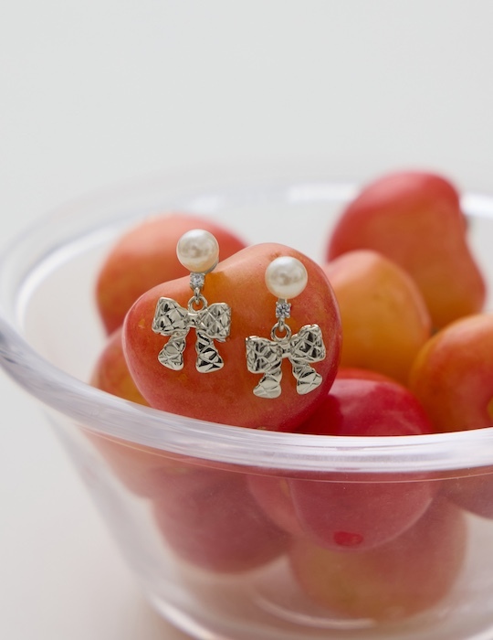 氣質珍珠菱格蝴蝶結。銀針耳環(銀)