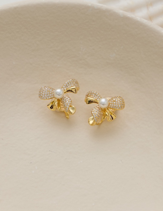 滿鑽珍珠蝴蝶結。夾式耳環(金)