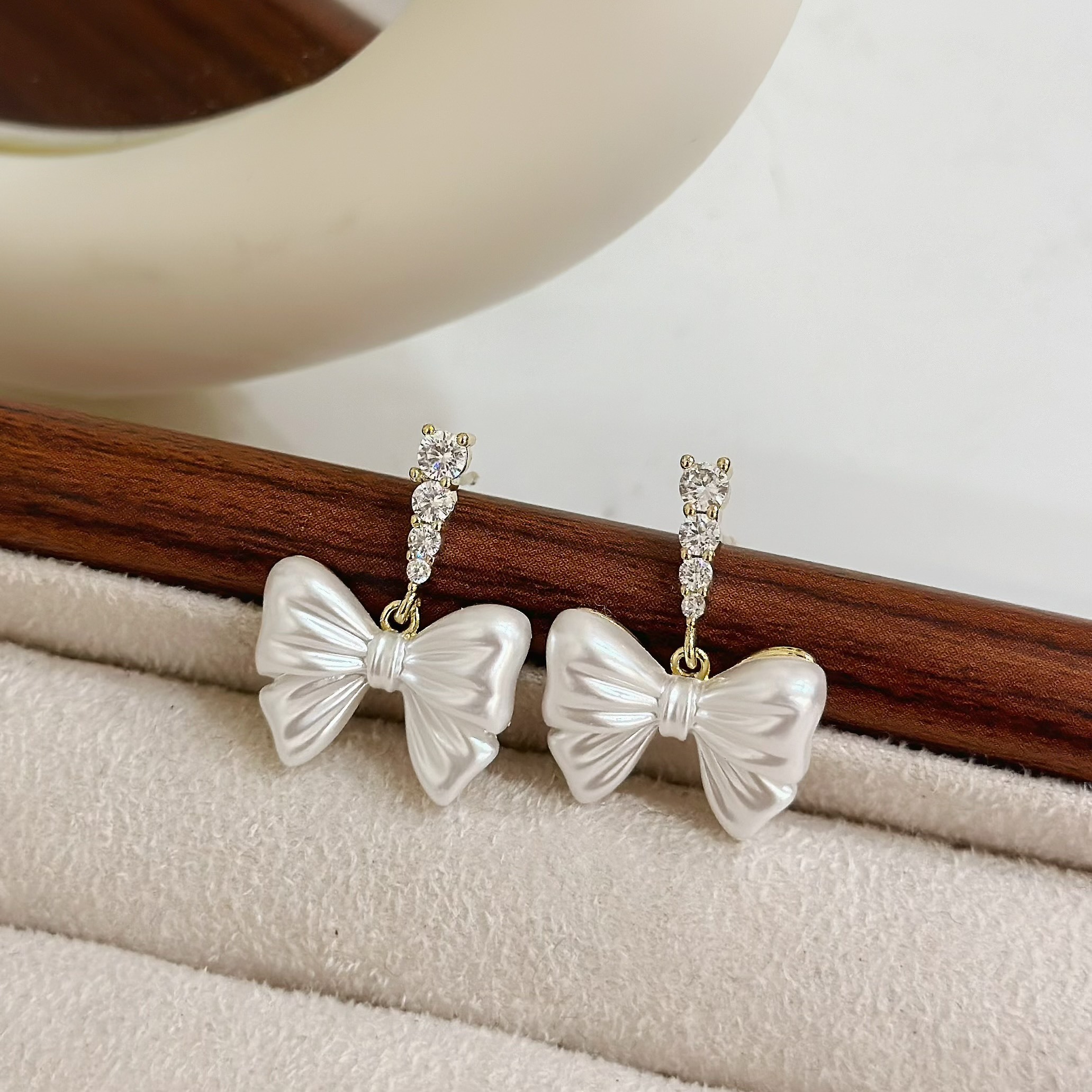 Q129排鑽光澤壓紋蝴蝶結垂吊