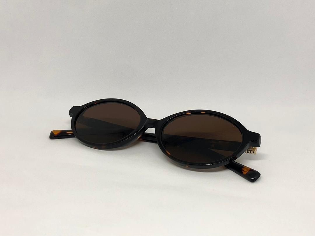 Miu Miu Mu04zs Brown
