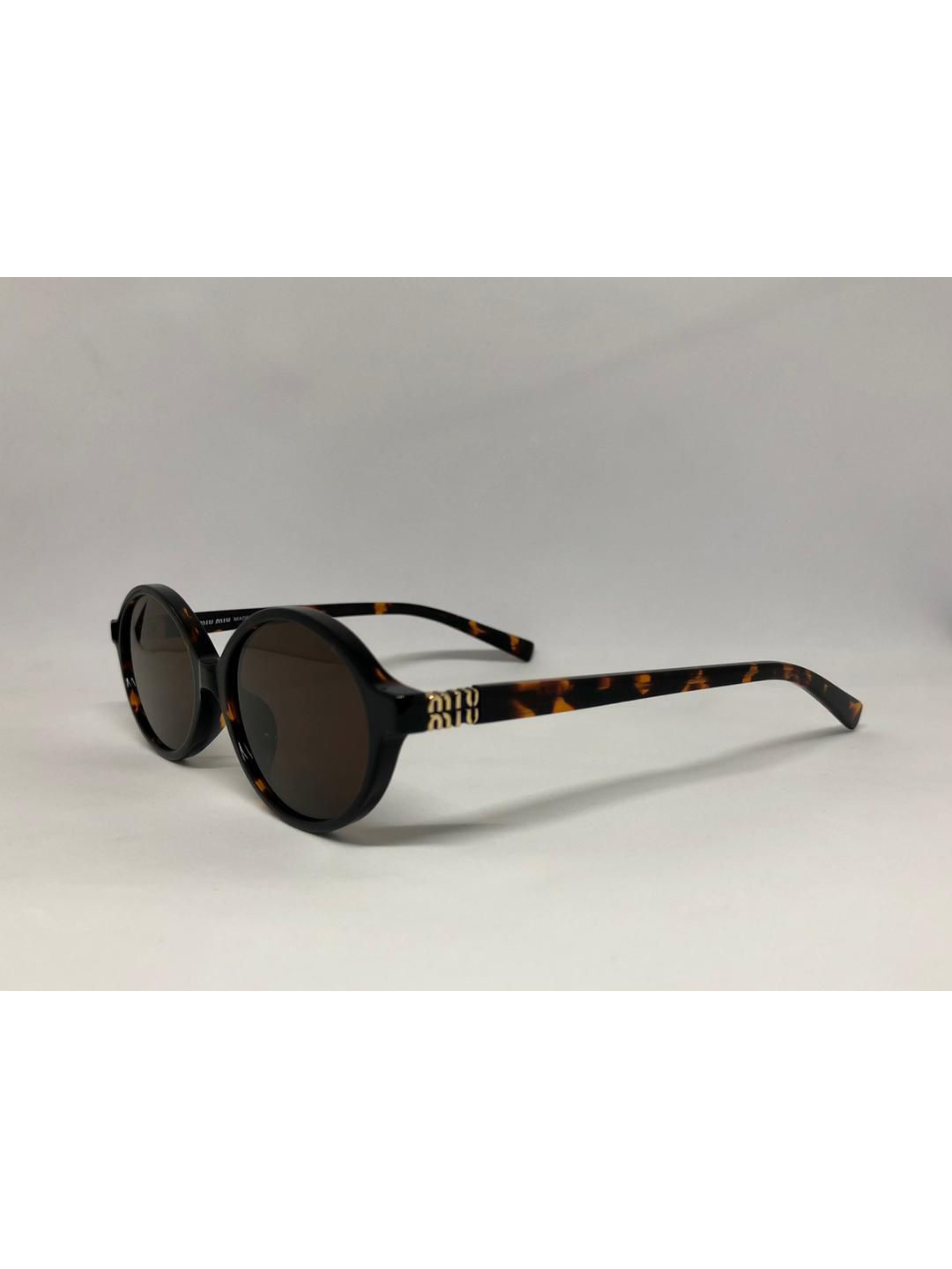 Miu Miu Mu04zs Brown