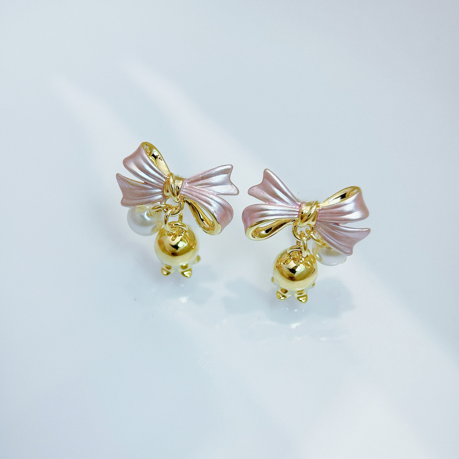 粉金鈴鈴蝴蝶結耳環