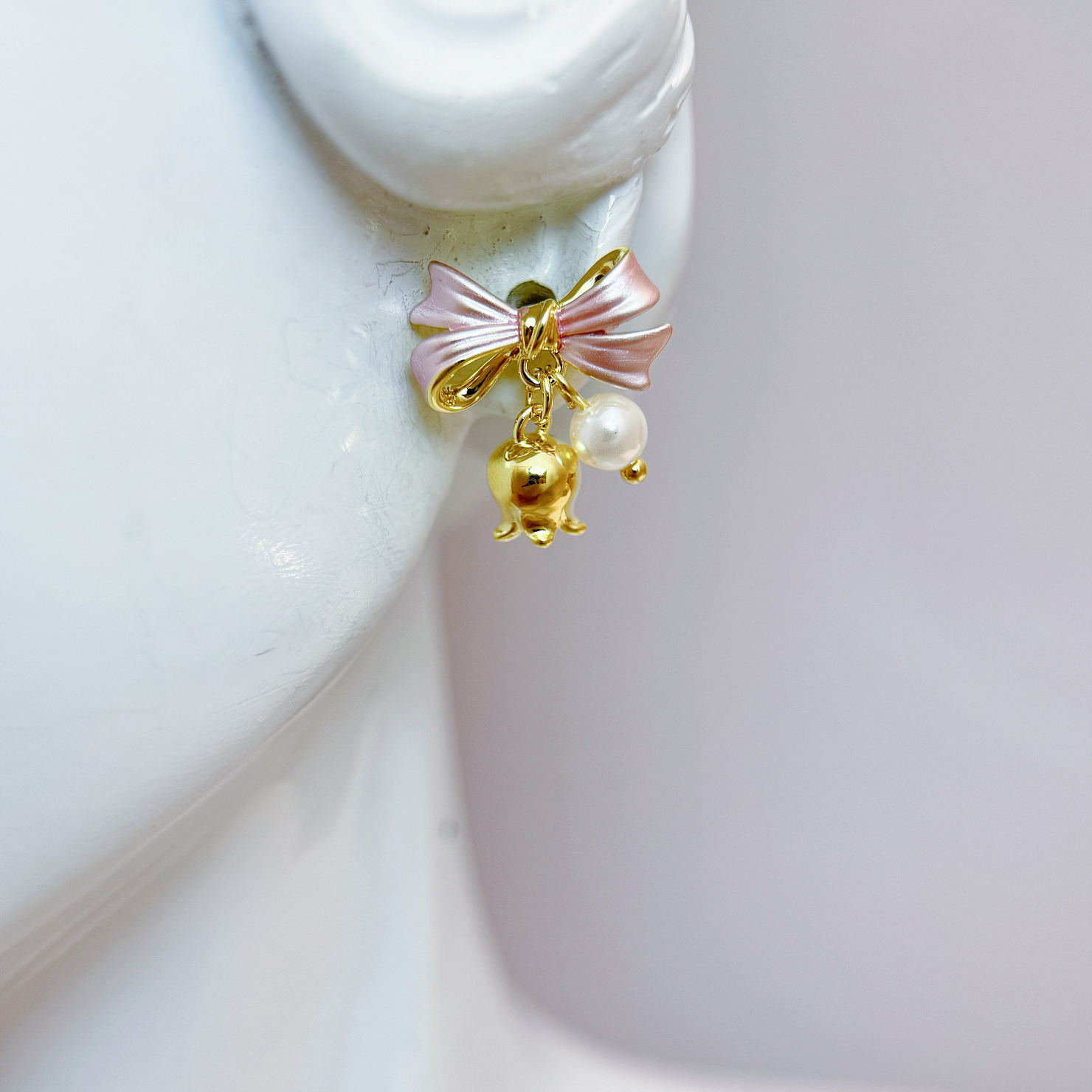 粉金鈴鈴蝴蝶結耳環