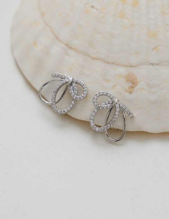 交織亮點。夾式耳環