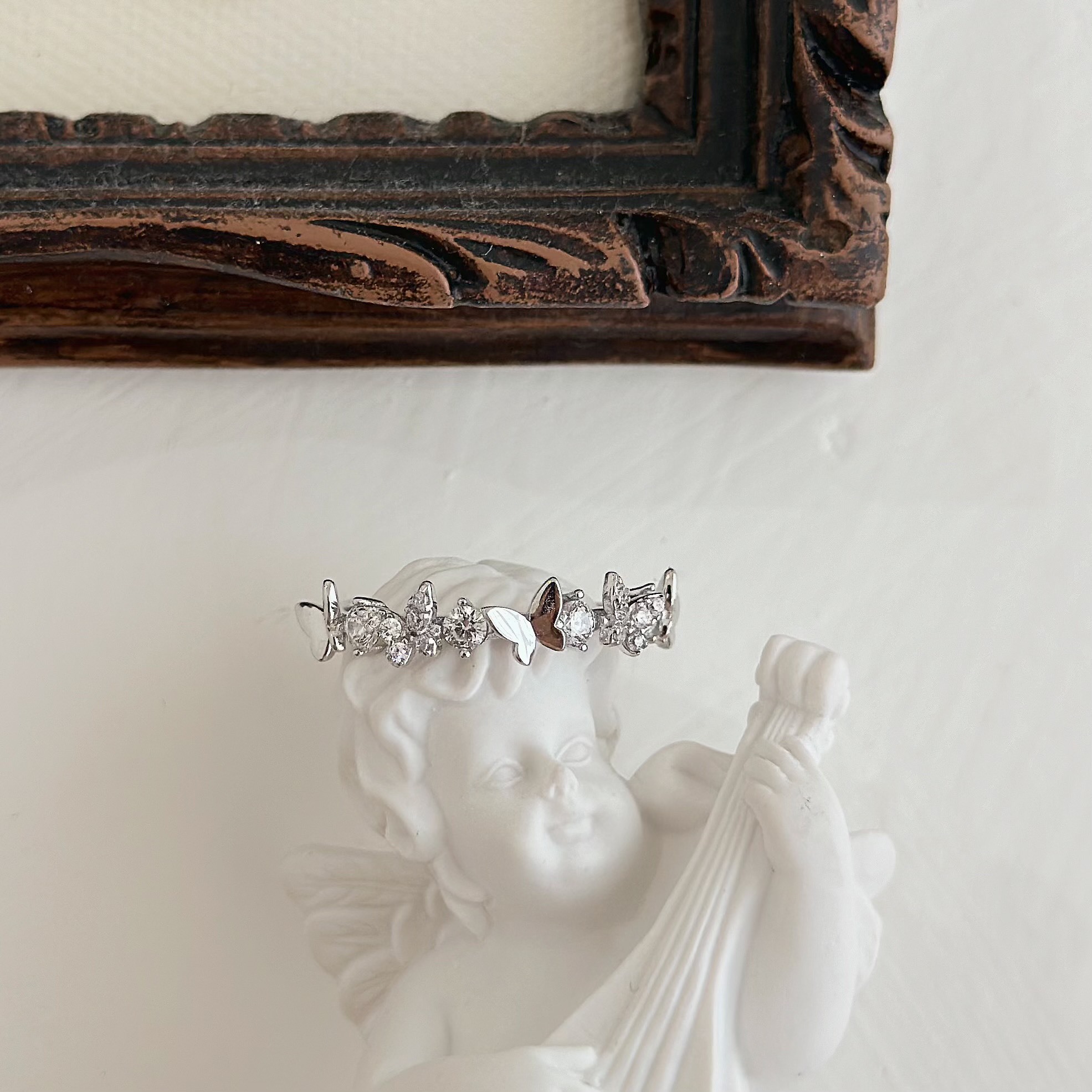 C23鋯石蝴蝶排鑽純銀調整戒