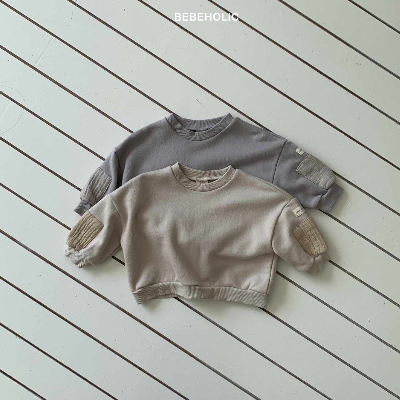 bebe 麵包感大學T