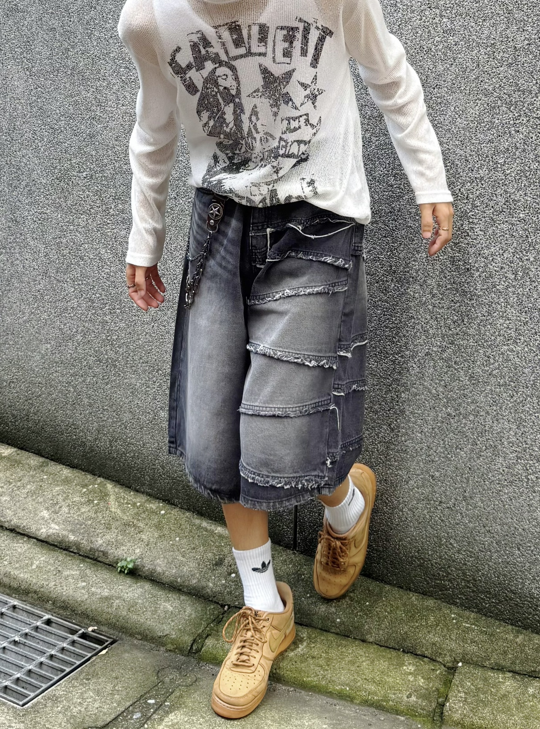 單邊滾圈刷破牛仔七分褲