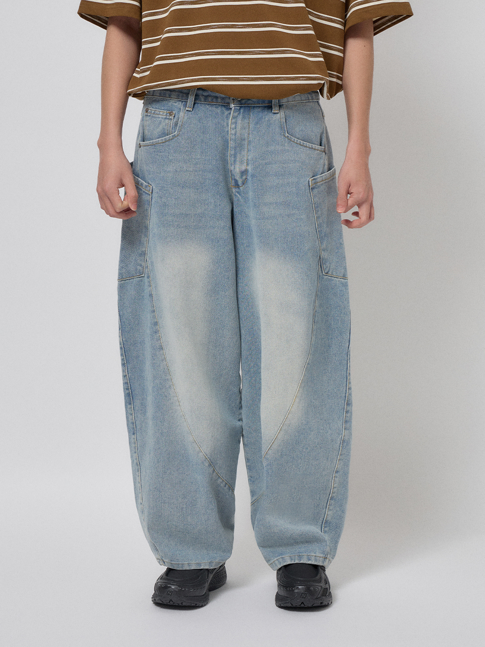 拼接線條彎刀牛仔褲