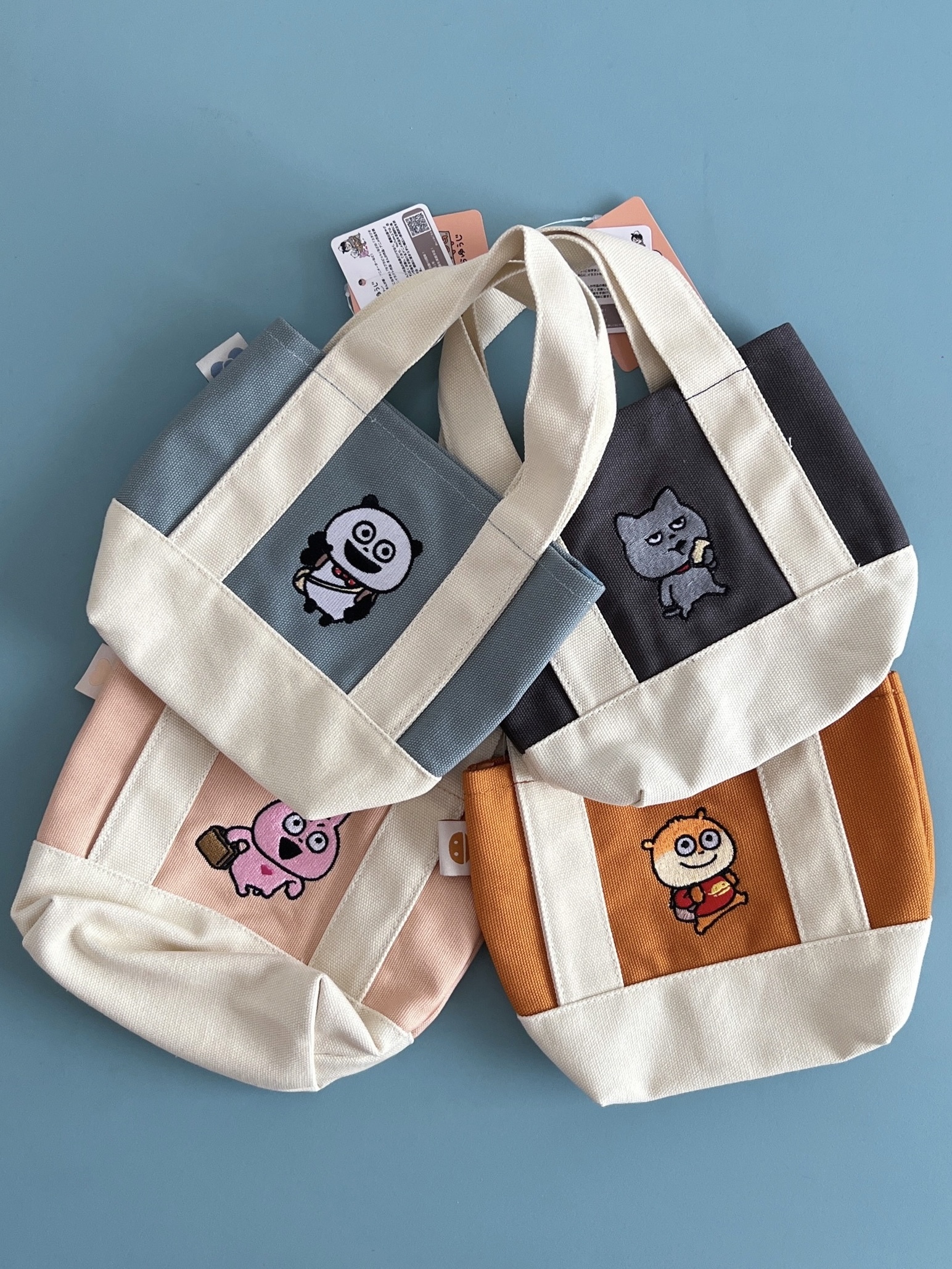 西村裕二刺繡造型小提袋