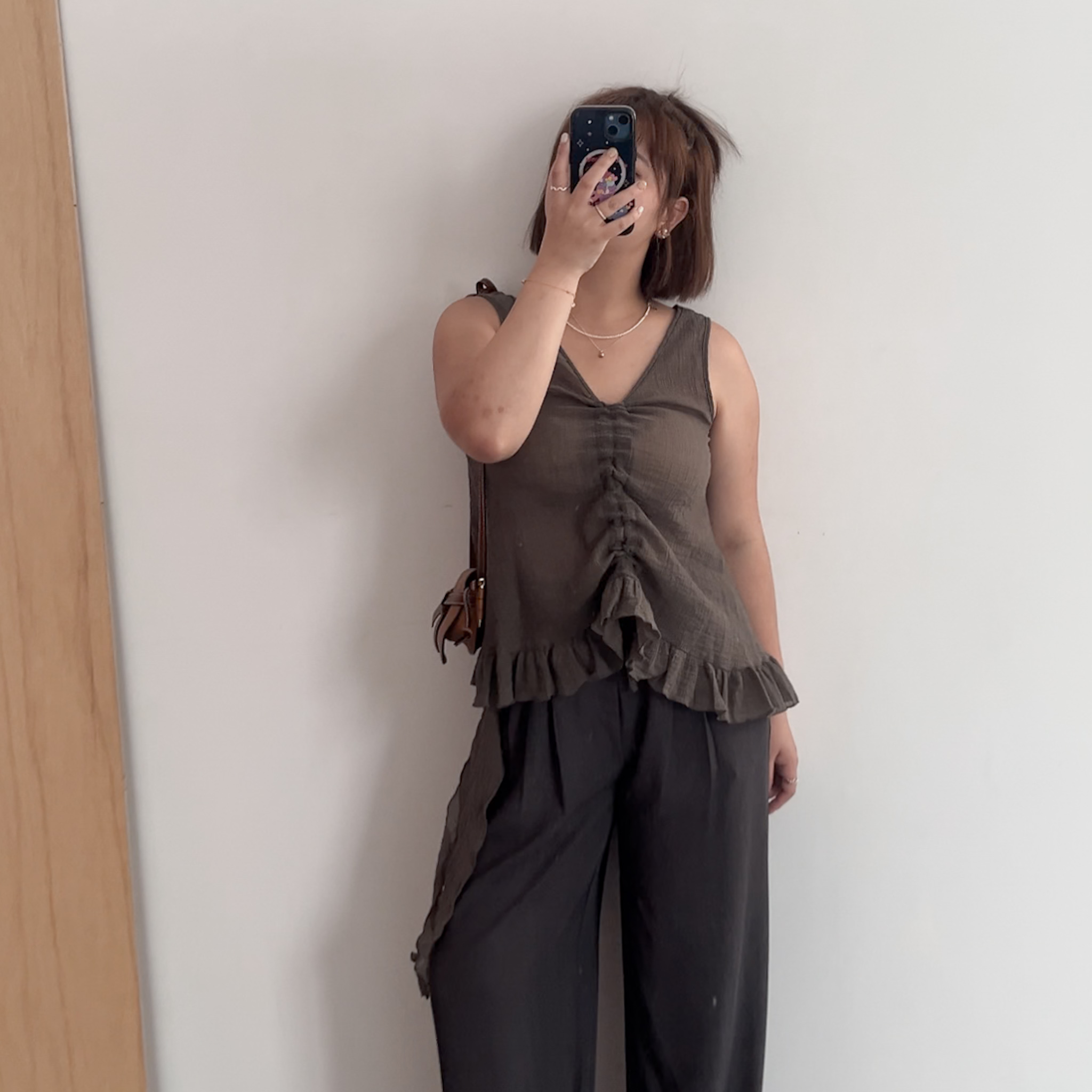 A38不規則下擺抽繩背心(咖)