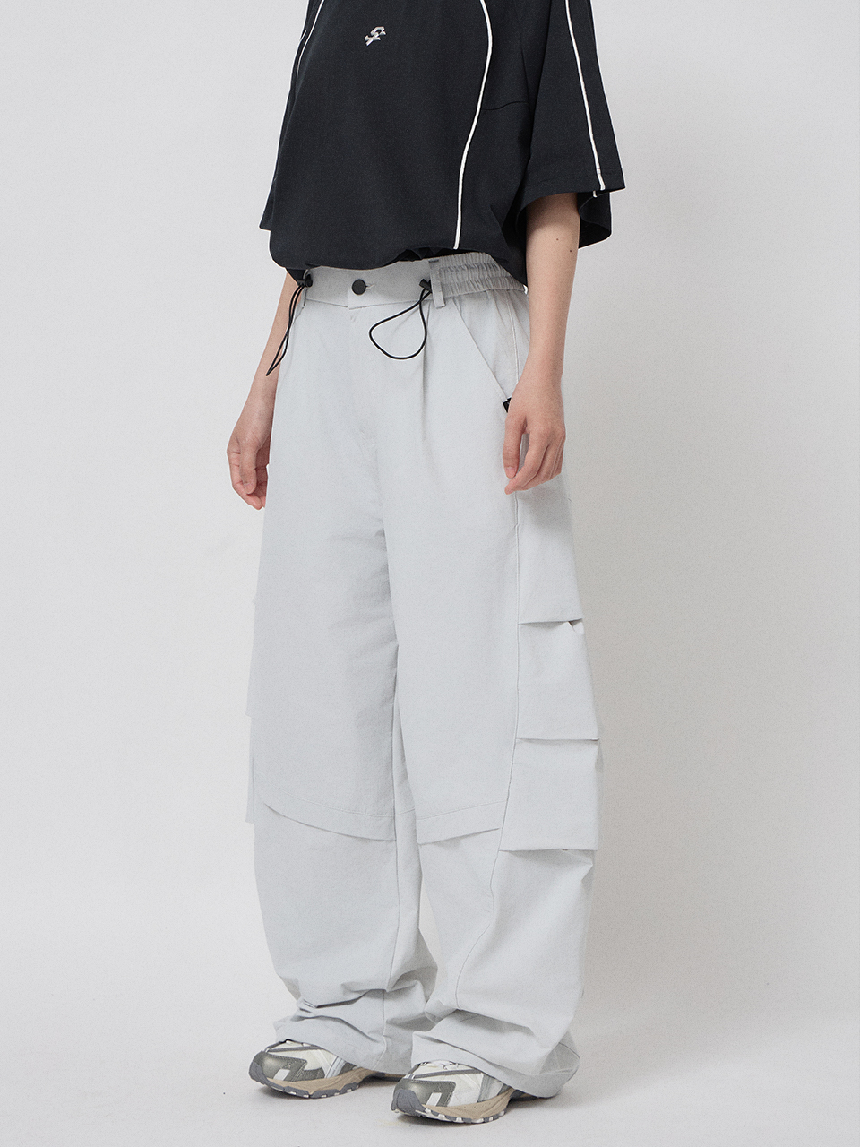 斜切剪接寬版機能長褲